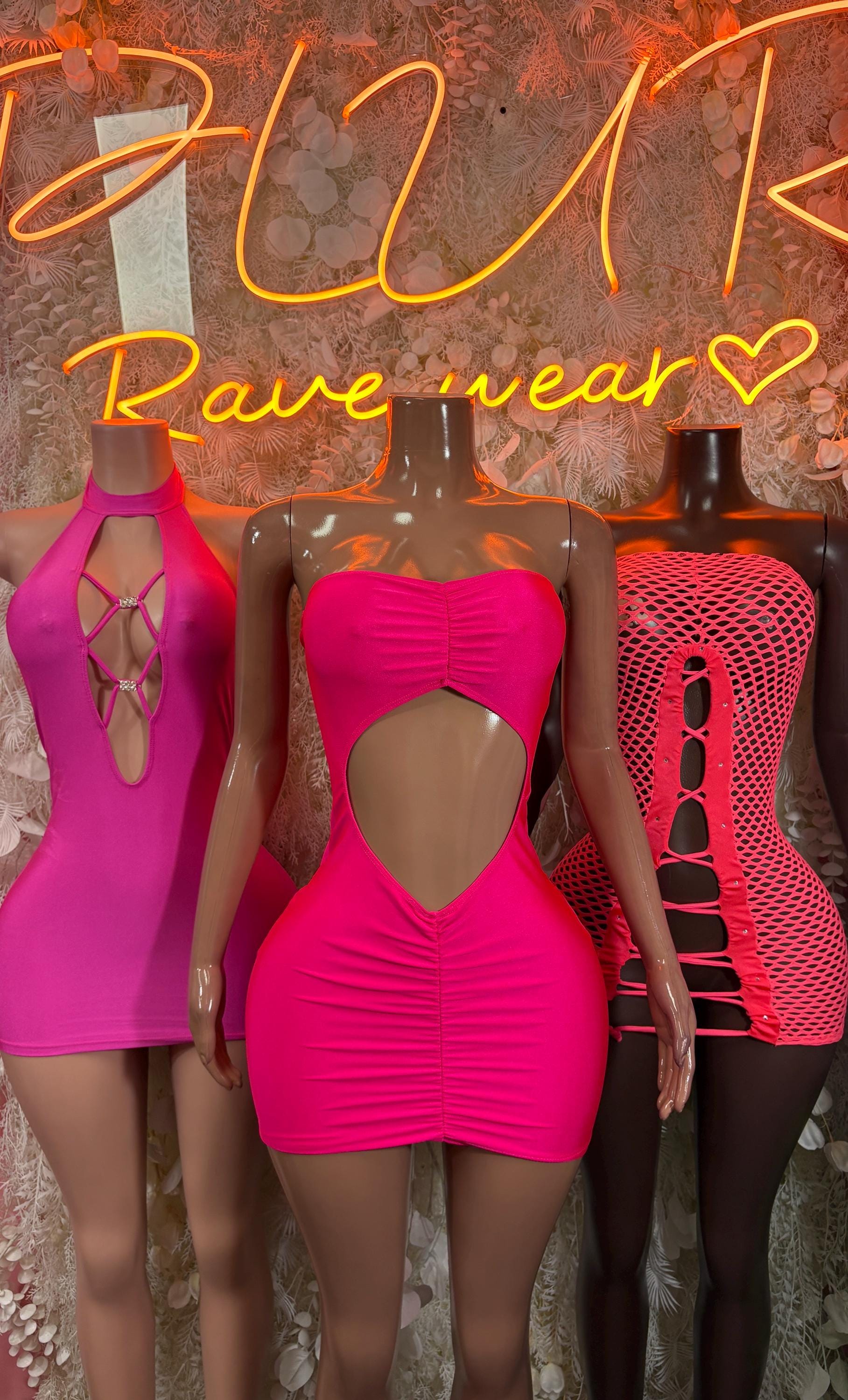 Pink fishnet mini dress on mannequin with lace-up detail
