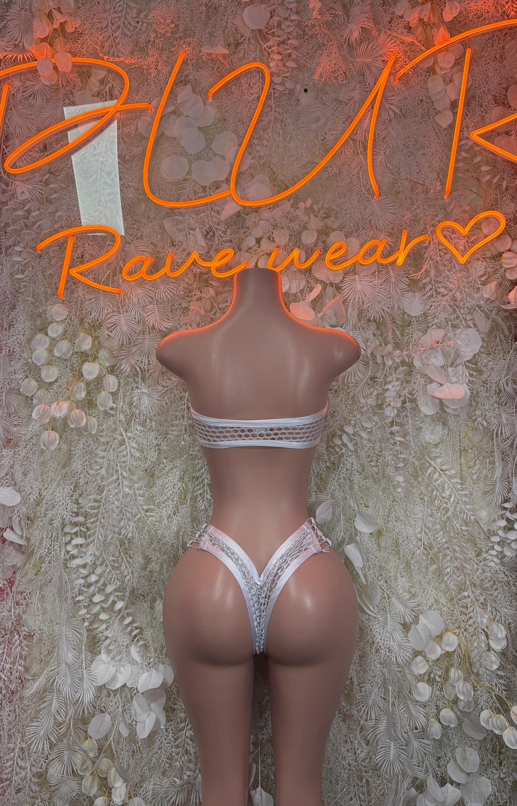 White fishnet two-piece set with bandeau bra and cheeky high-cut bottoms