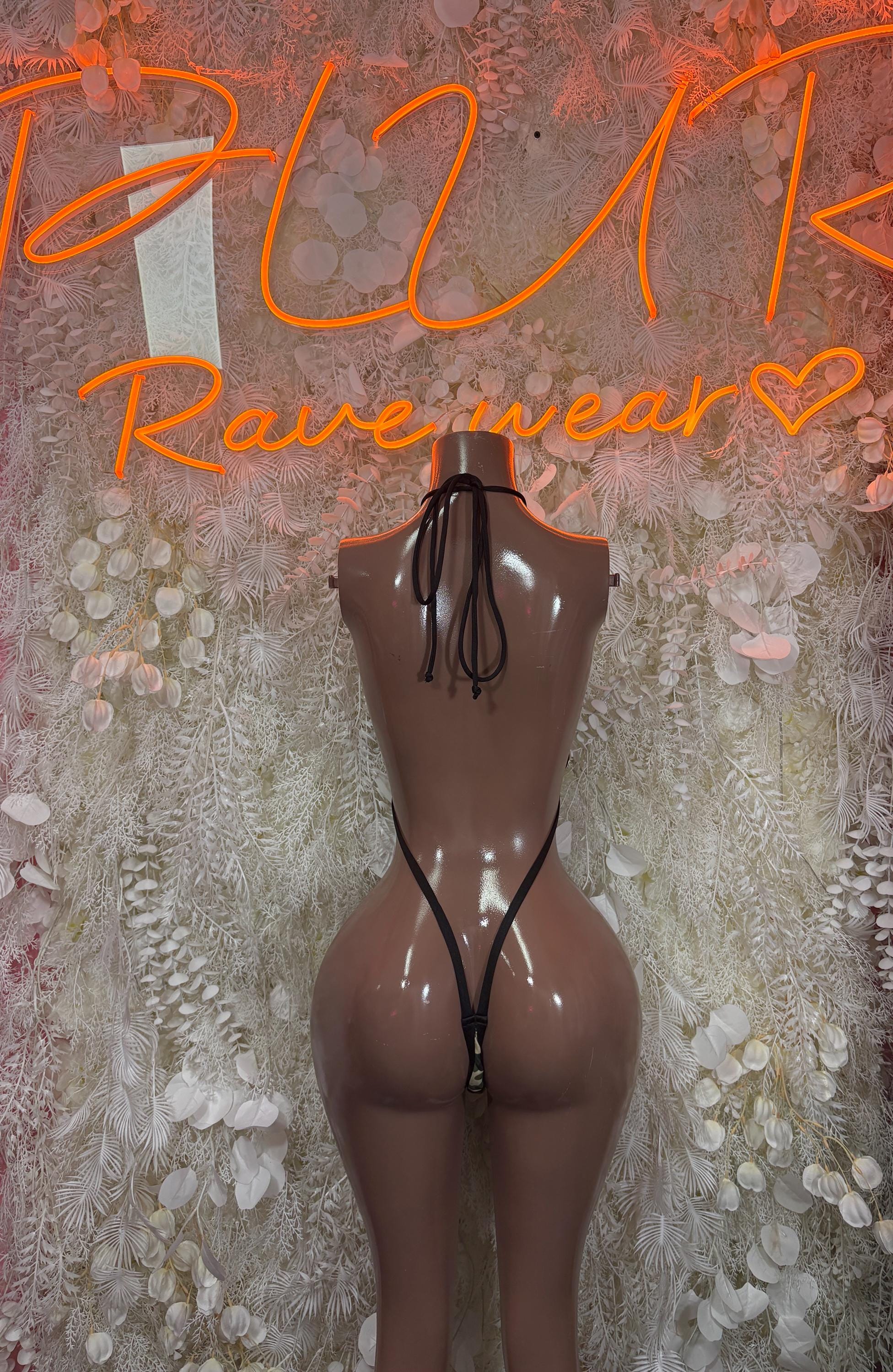 Black one-piece festival bodysuit with leopard-print back and tie shoulder straps