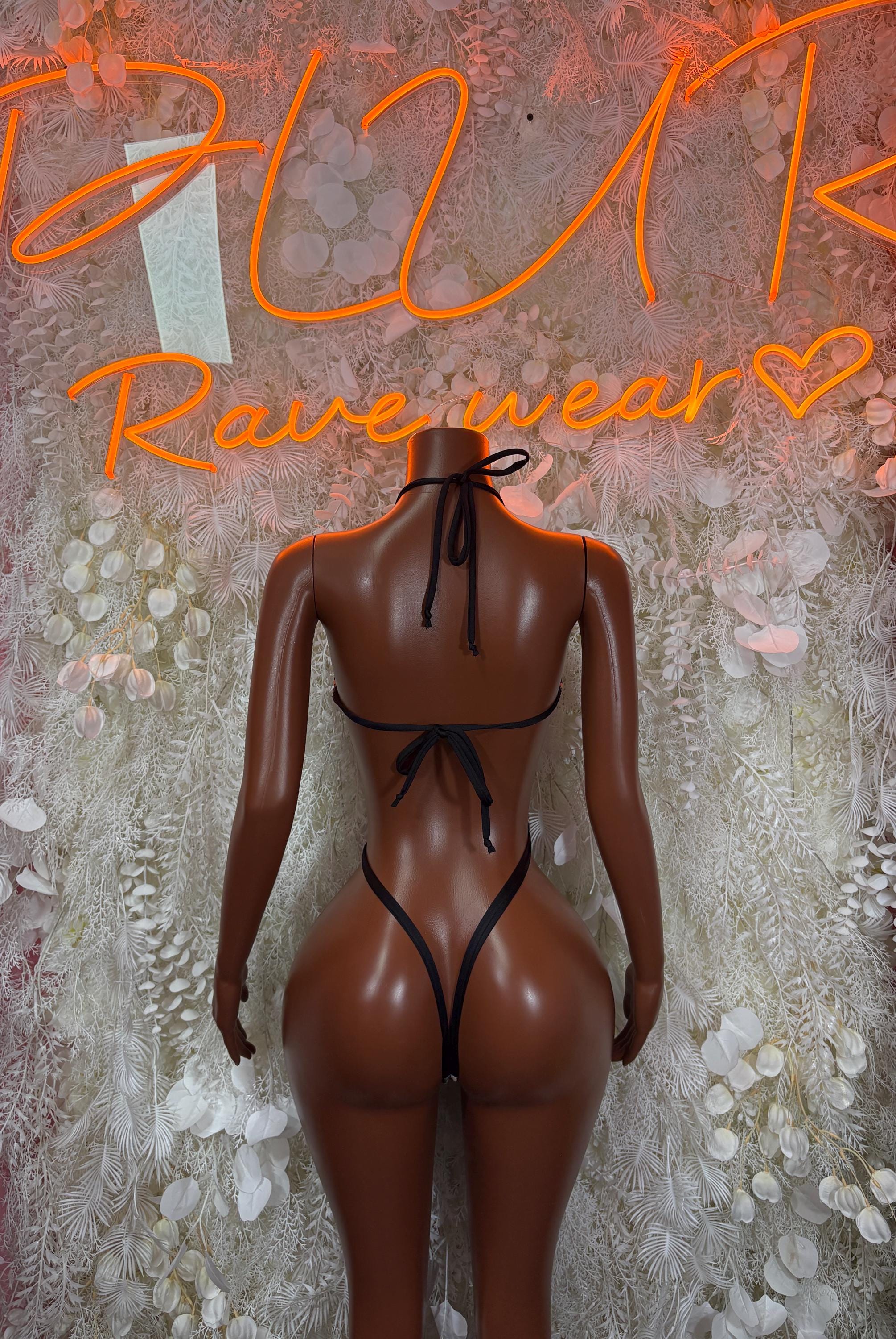 Leopard print thong with tie-back halter straps and center ring detail