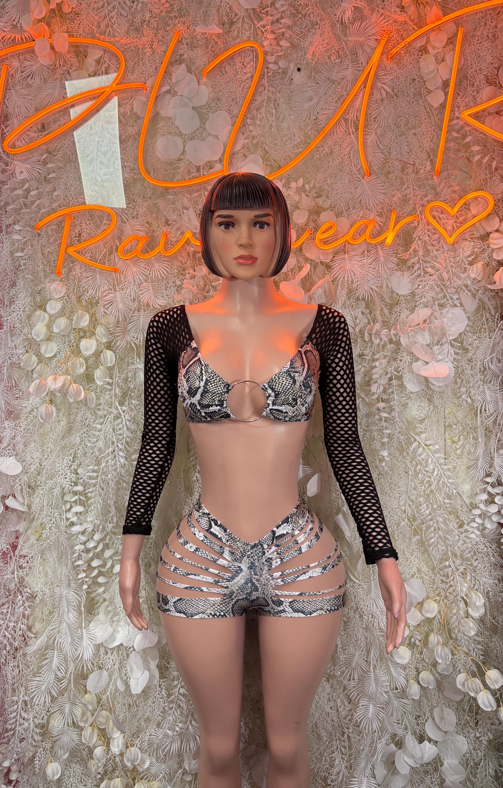 Snake print bodysuit with black mesh sleeves, lace-up shorts and bra top
