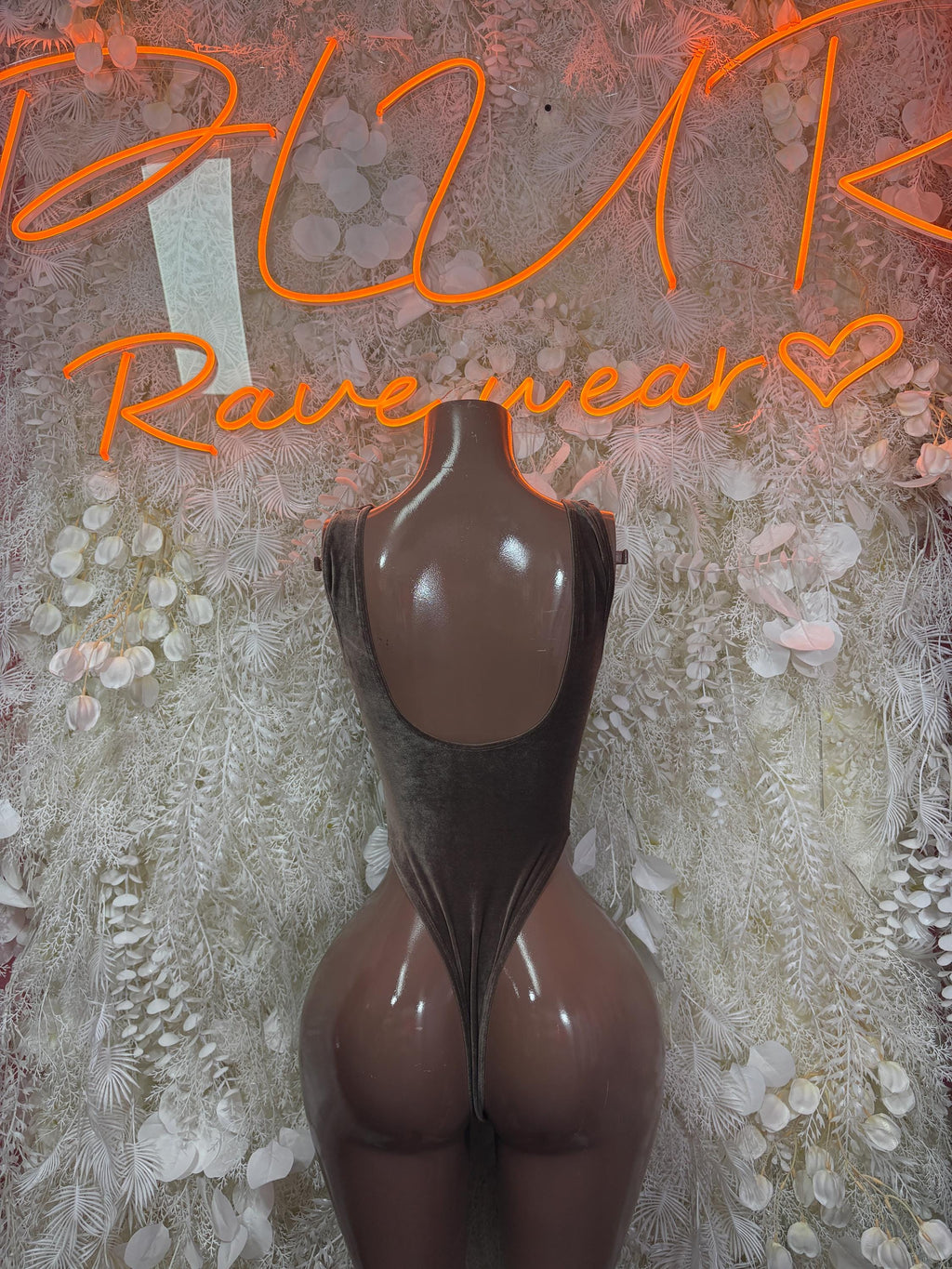 Velvet bodysuit with deep U-back and high-cut leg, dark