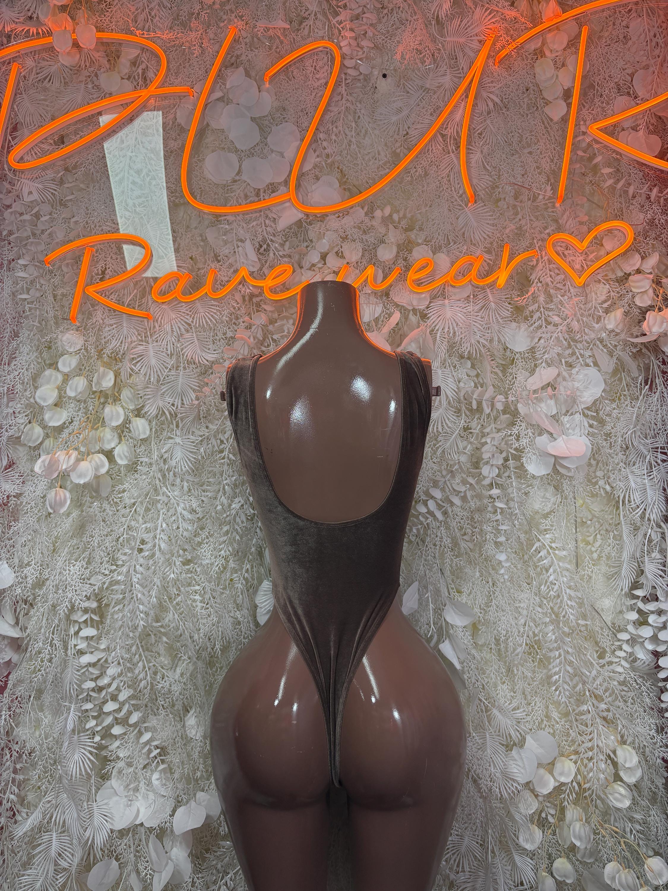 Velvet bodysuit with deep U-back and high-cut leg, dark