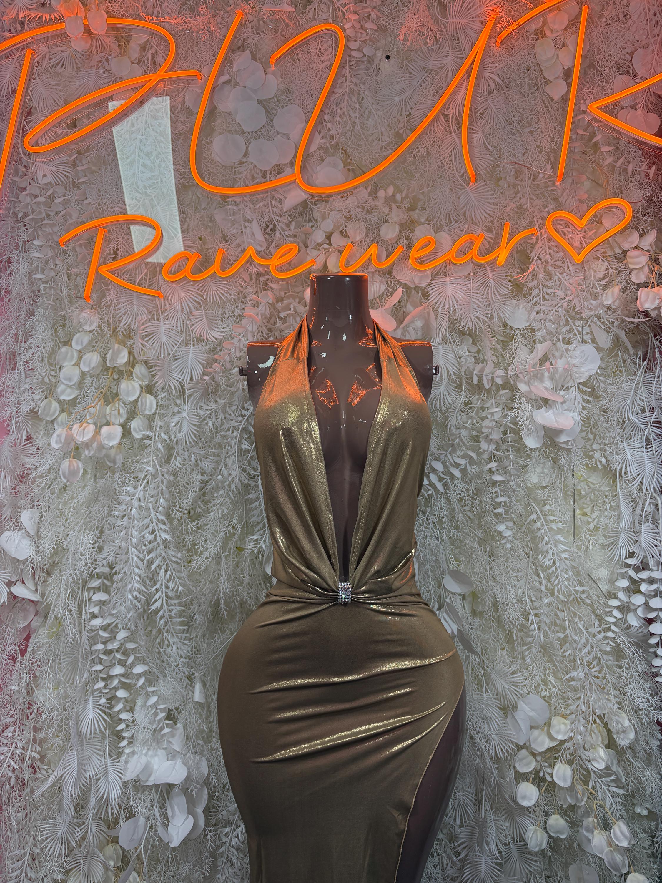Metallic gold halter gown with ruched waist and draped V-neck front