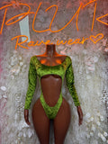 Green velvet bodysuit with long sleeves, scoop neck, and central cutout