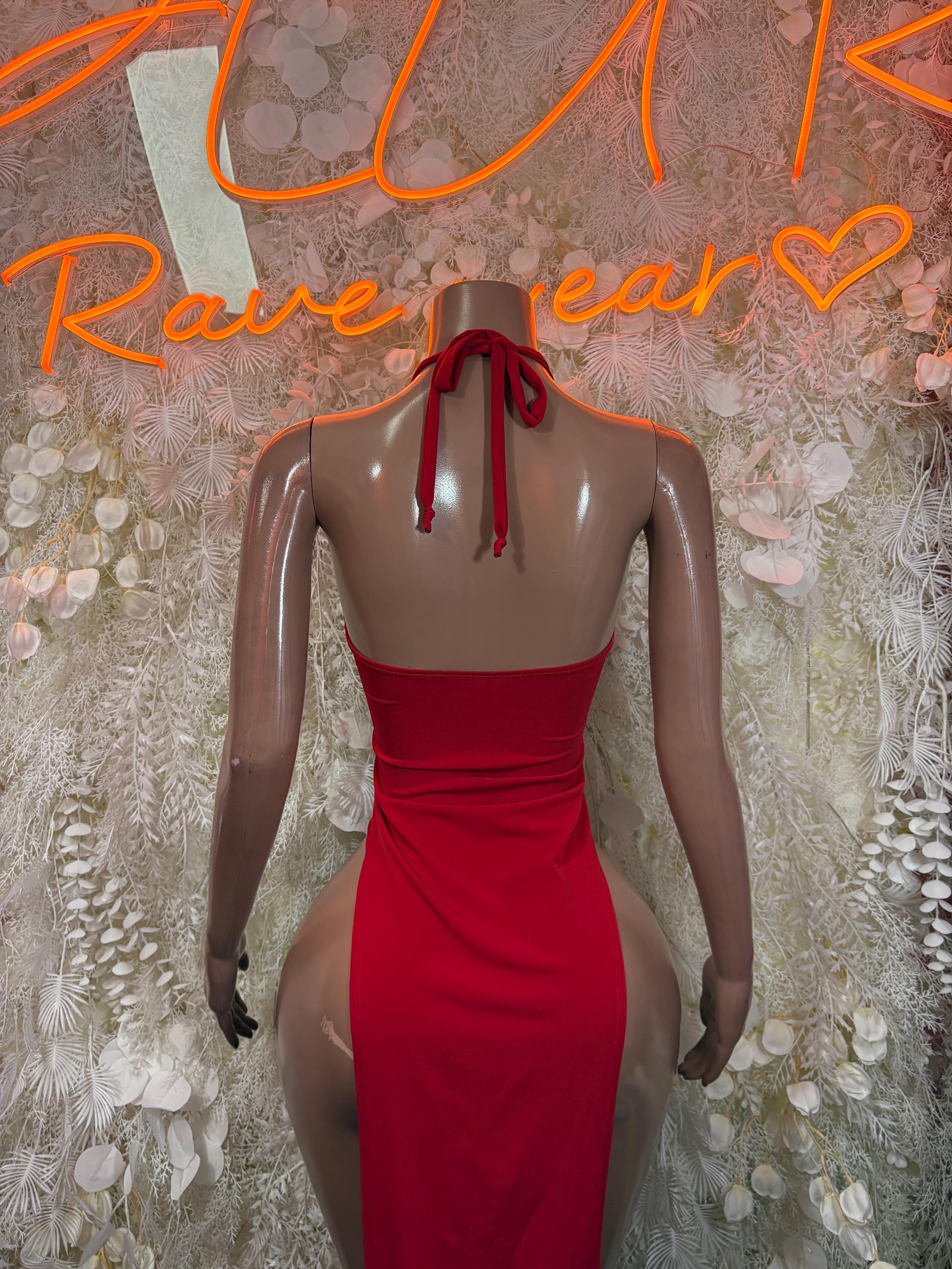 Red backless halter gown with tie straps and ruched back, back view