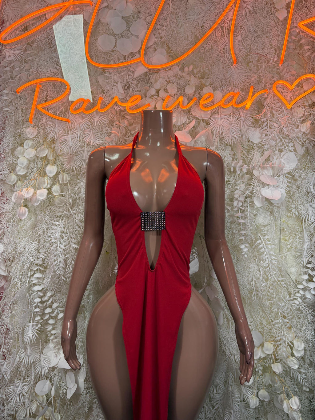 Red halter gown with rhinestone bust detail and deep V neckline, front view