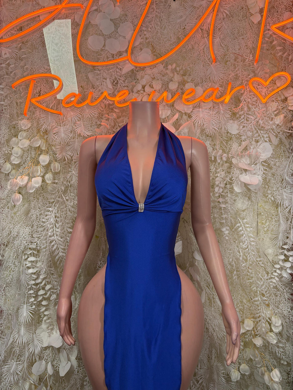 Royal blue halter gown with deep V neckline and backless cutout