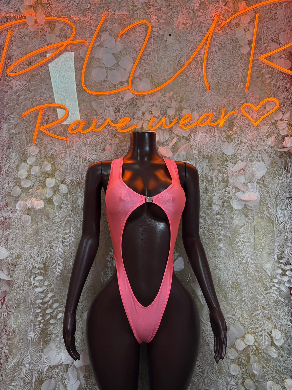 Pink festival bodysuit with oval cutout and halter-style neckline