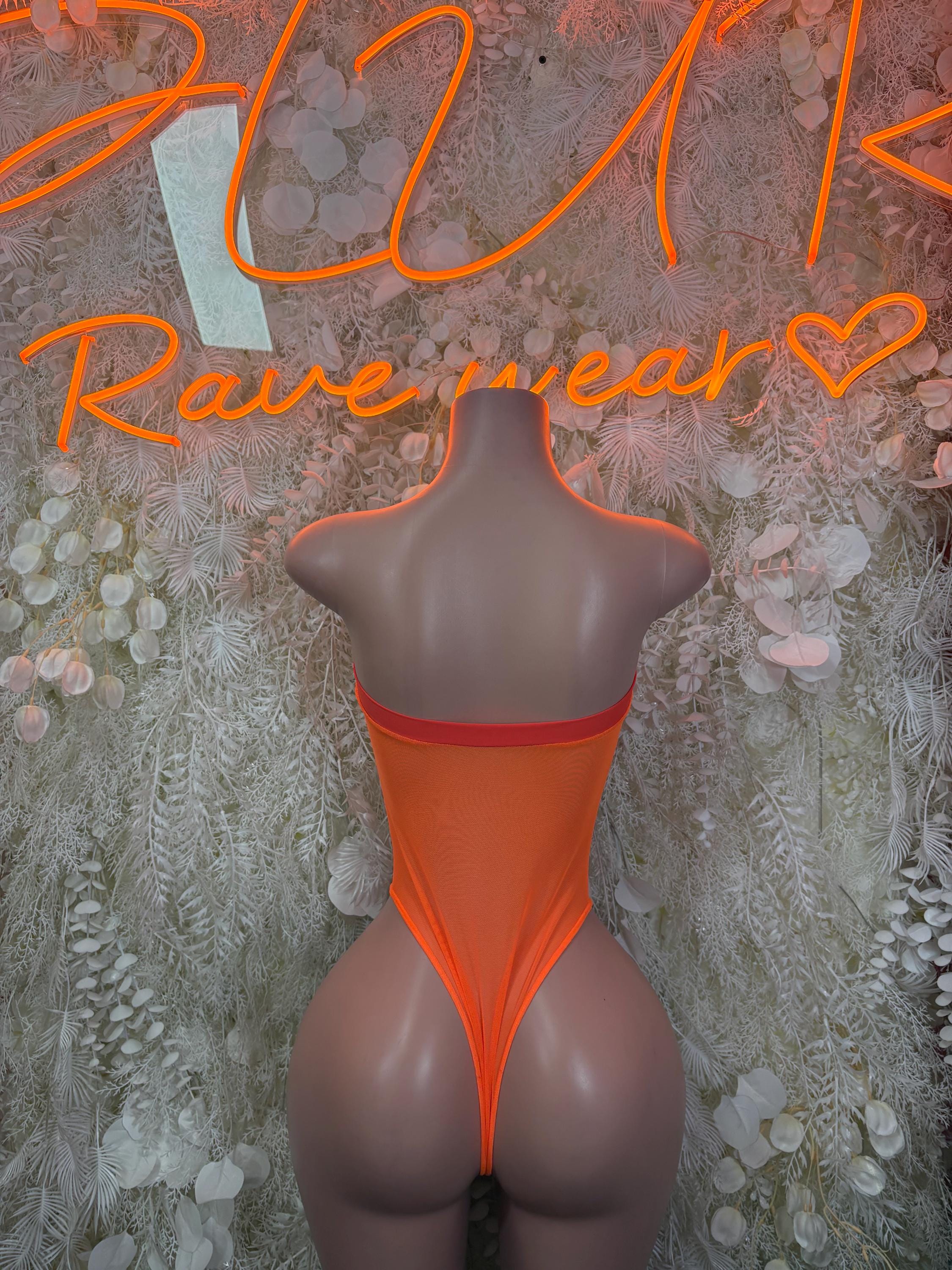 Orange backless halter bodysuit with narrow straps and deep V back