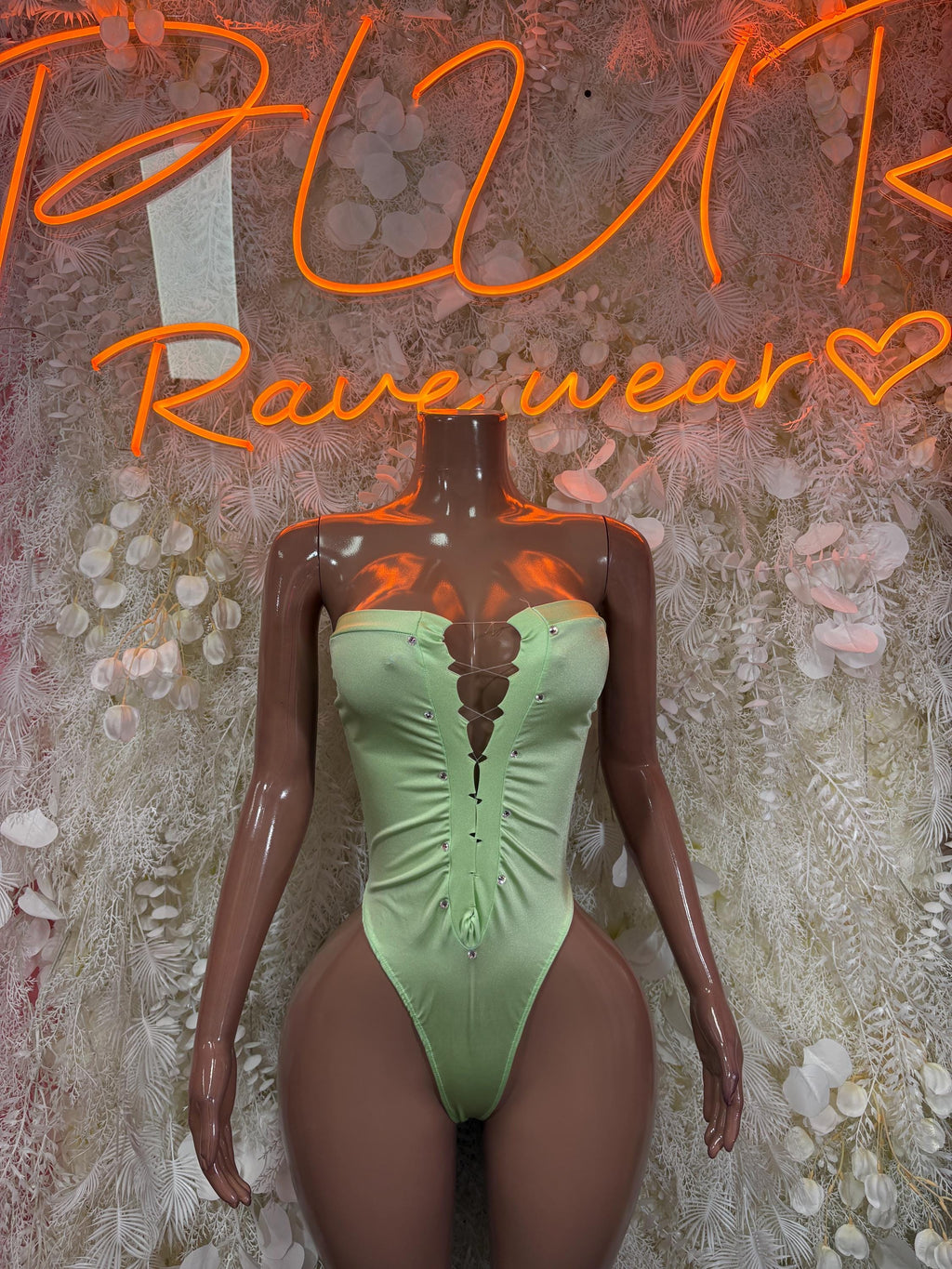 Mint green metallic bodysuit with sweetheart neckline and lace-up front detail