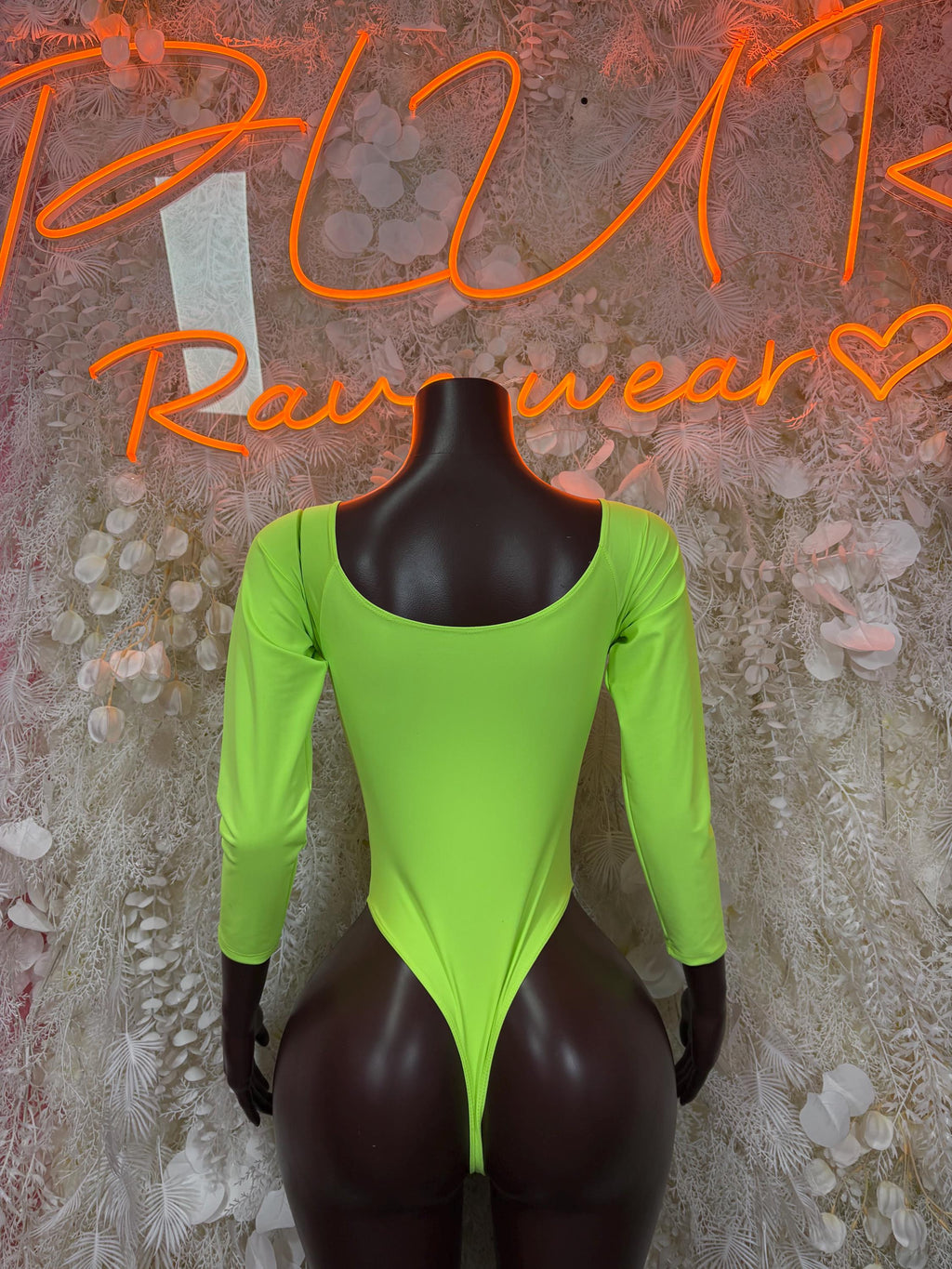 Neon green long-sleeve bodysuit with scoop back and full coverage legs