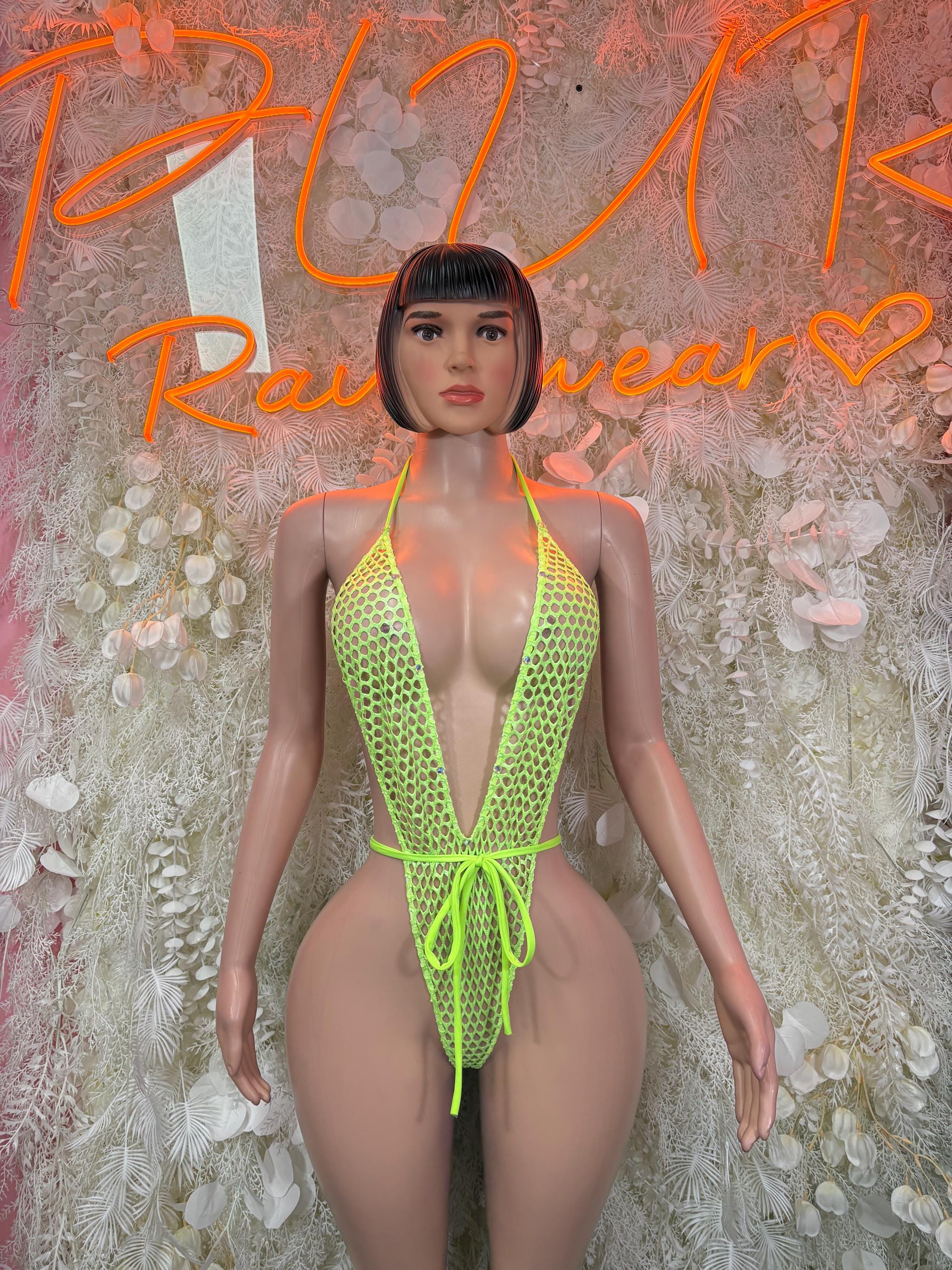 Neon green fishnet one-piece dancewear with halter straps and tie front