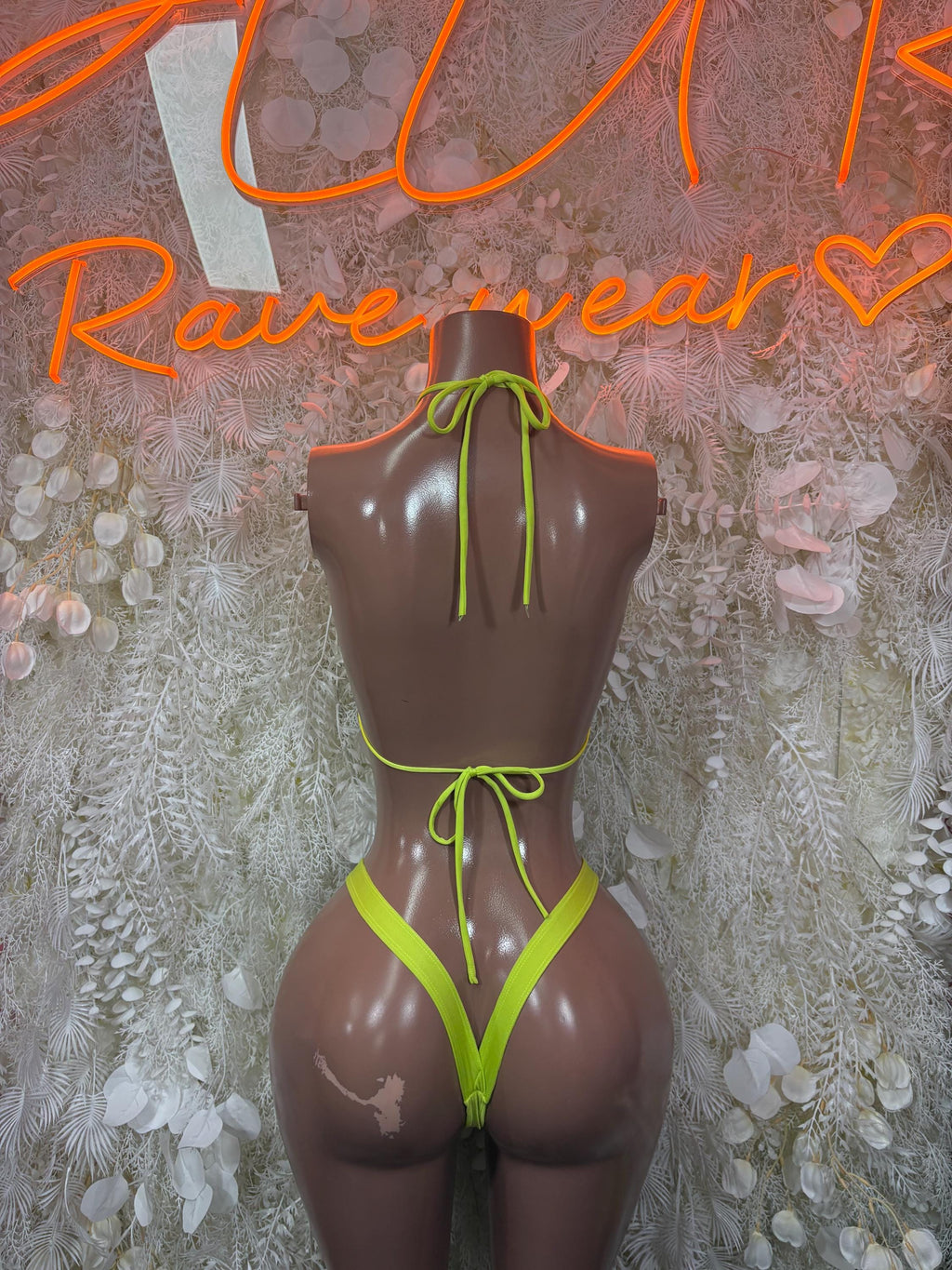 Neon green bikini set with adjustable tie straps at the back and high-leg bottoms