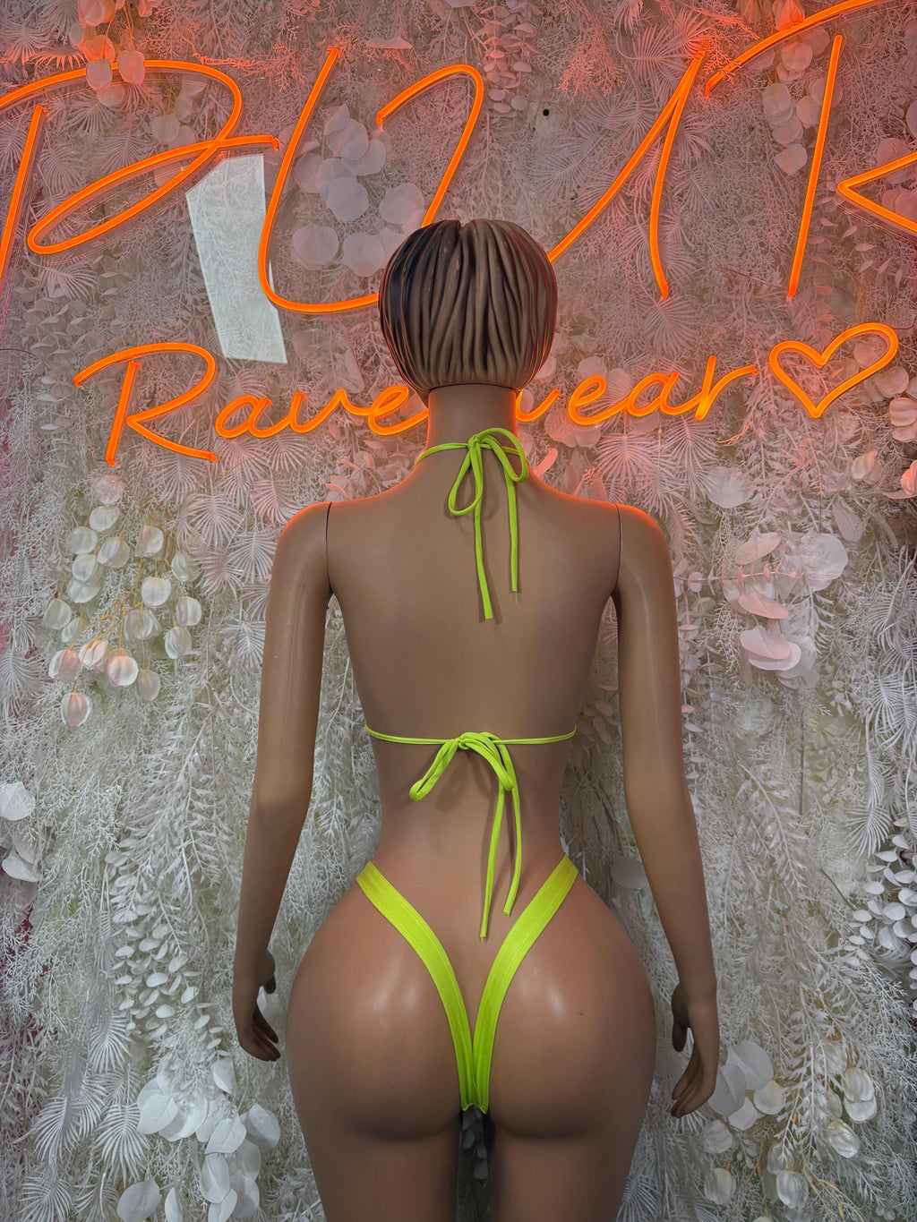 Neon green bikini set, back view, triangle top and tie-string high-cut bottoms