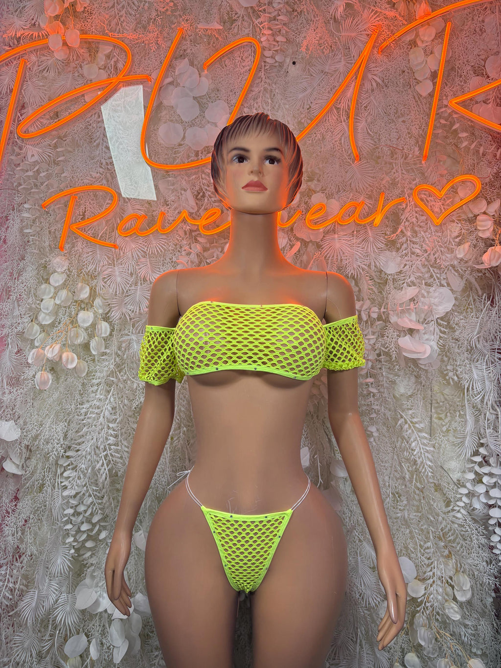 Neon green fishnet bikini set with off-shoulder bandeau top and high-cut bottoms