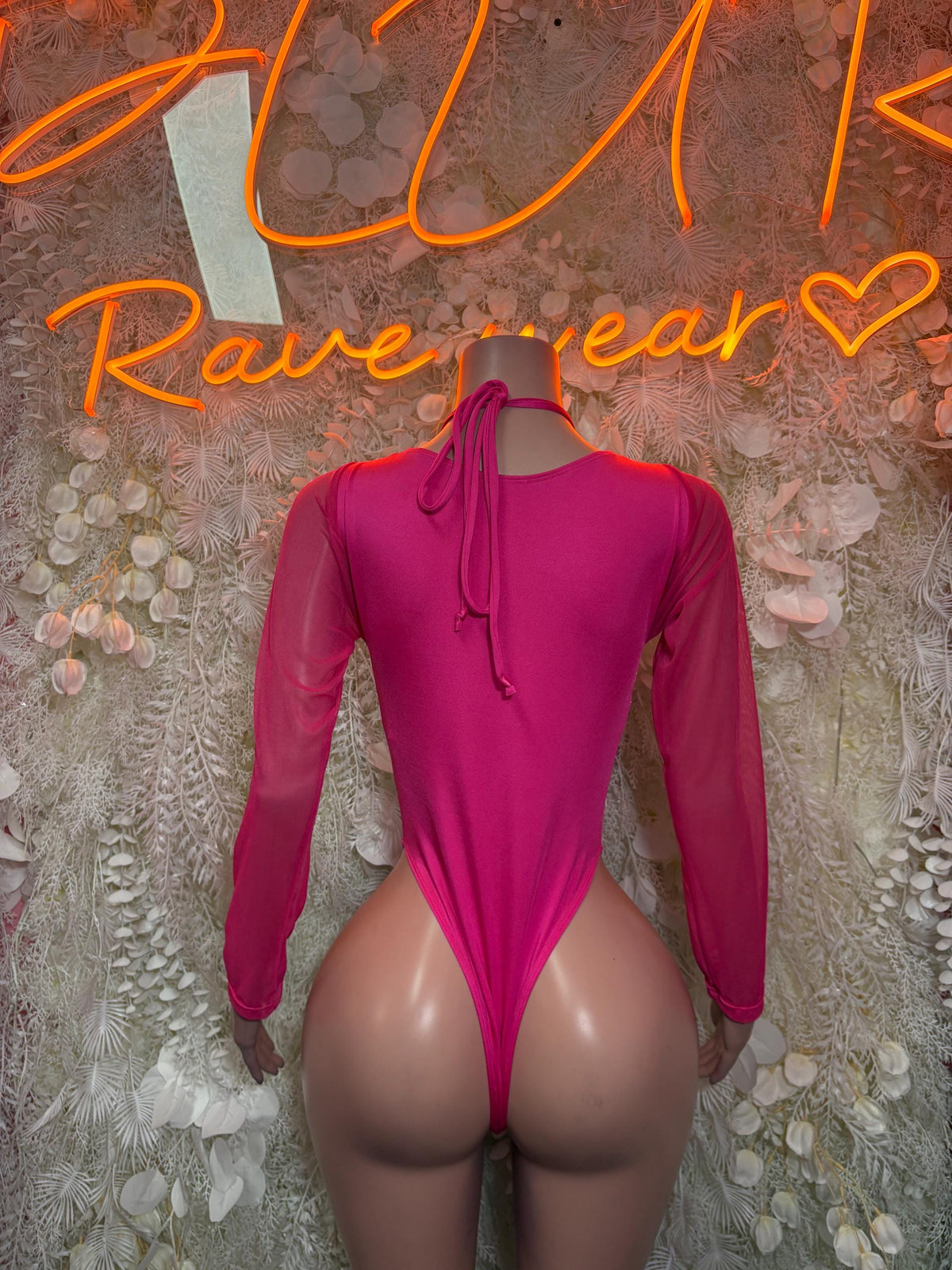 Hot pink cheetah-print metallic one-piece bodysuit with back tie-up and long sleeves