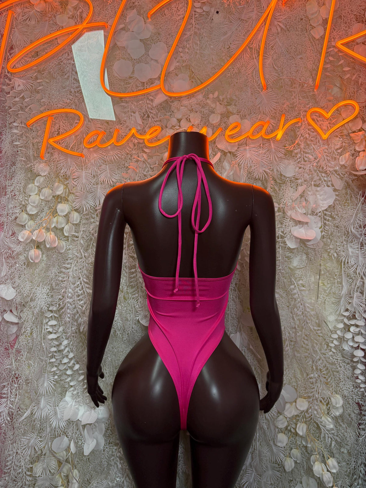 Hot pink cheetah-pattern metallic bodysuit with halter straps and open-back tie