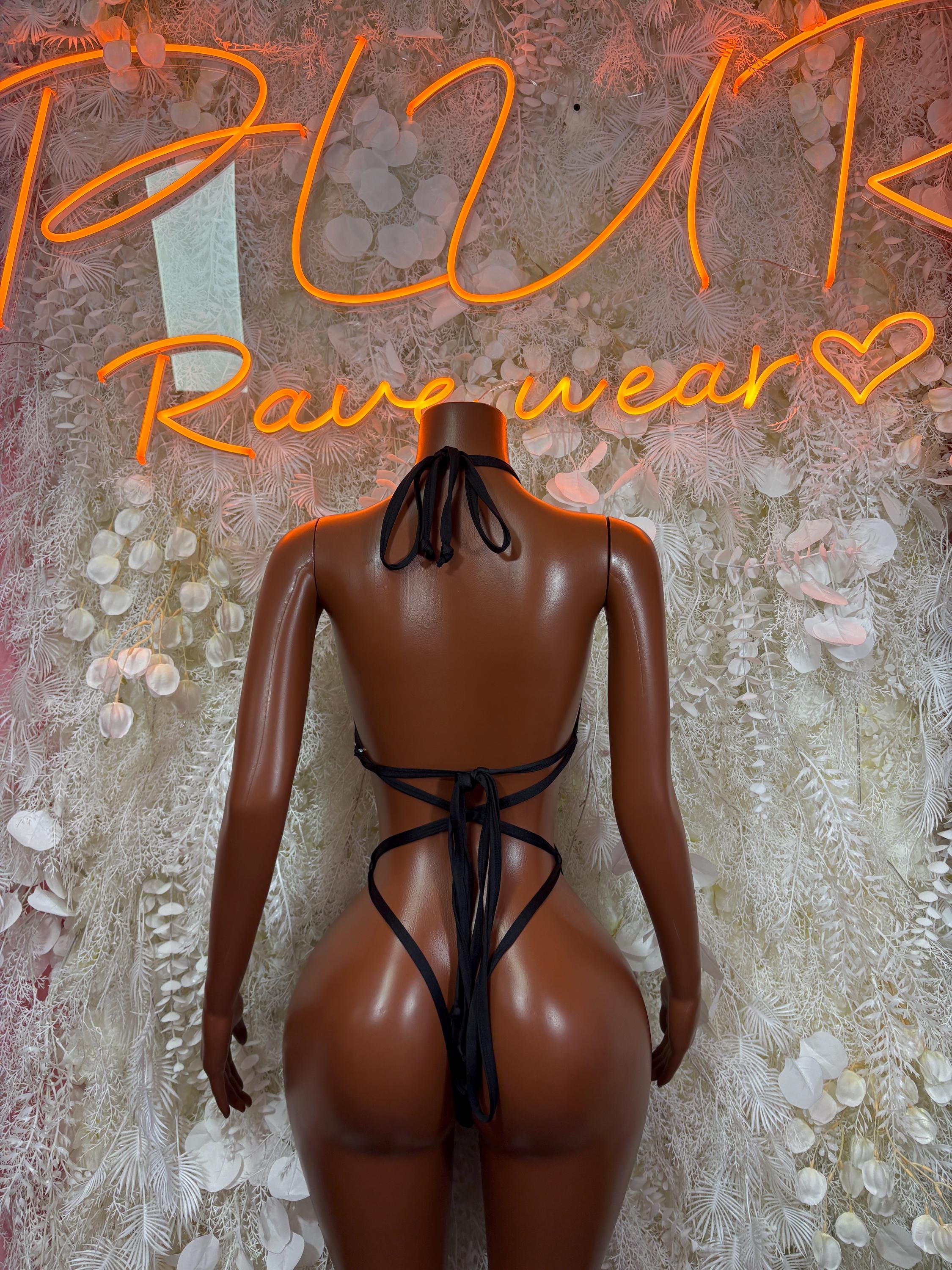 Backless leopard-print bodysuit with strappy lace-up tie at the back
