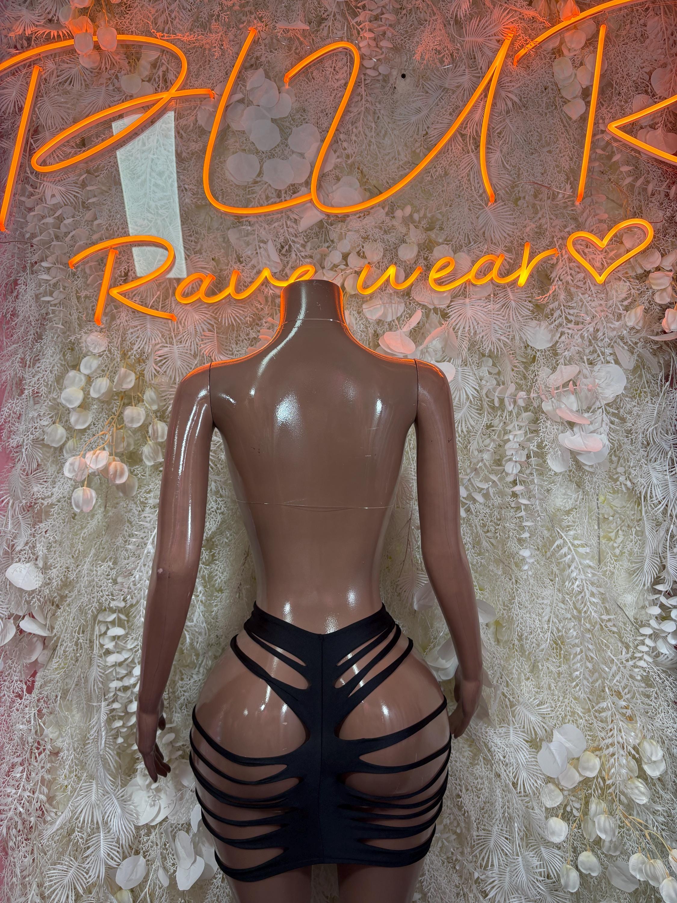 Black two-piece dance bodysuit with sparkly bra cups and strappy mini skirt back view