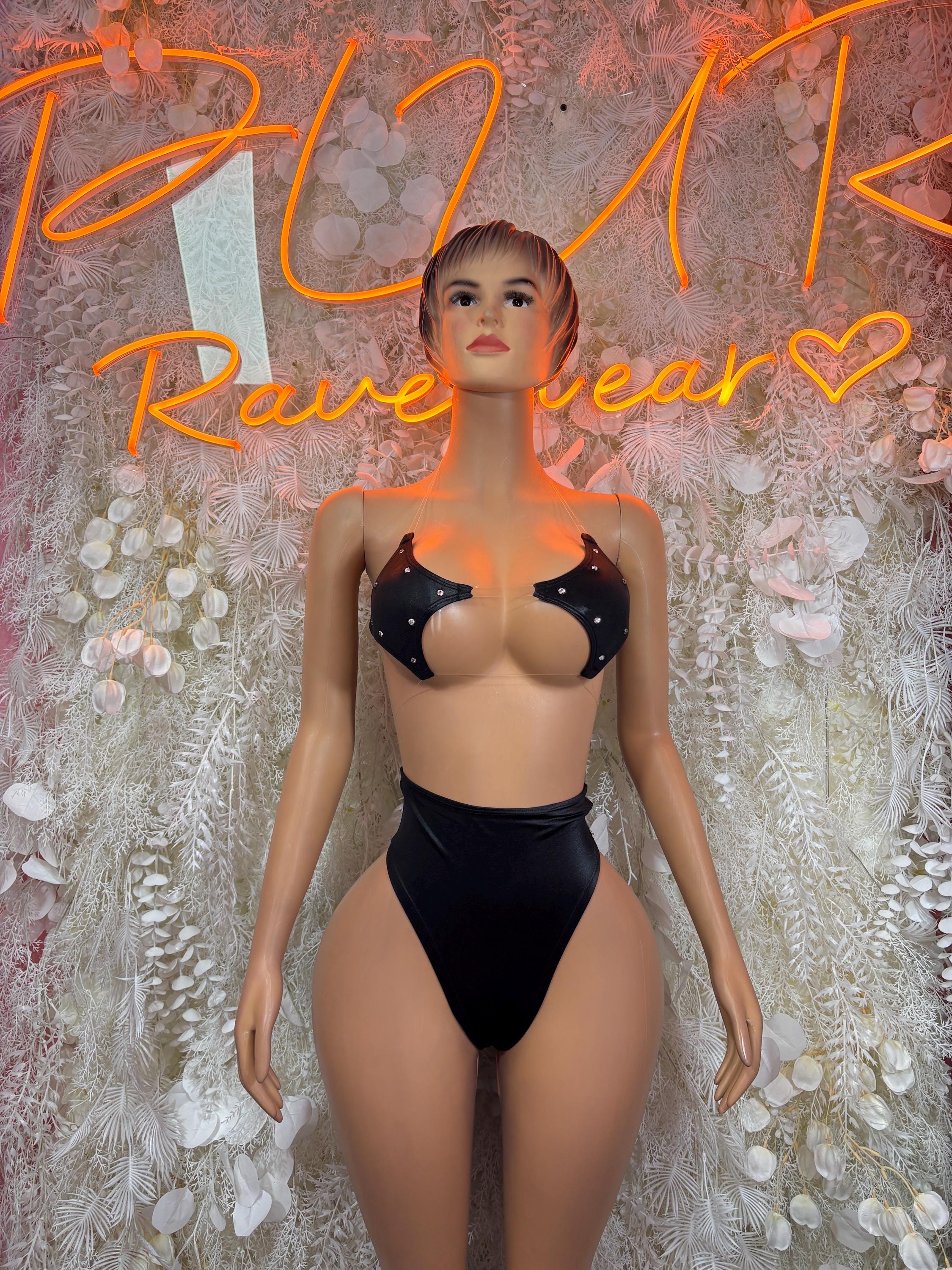 Black two-piece dance bodysuit with jeweled star-dotted bra and high-waist briefs
