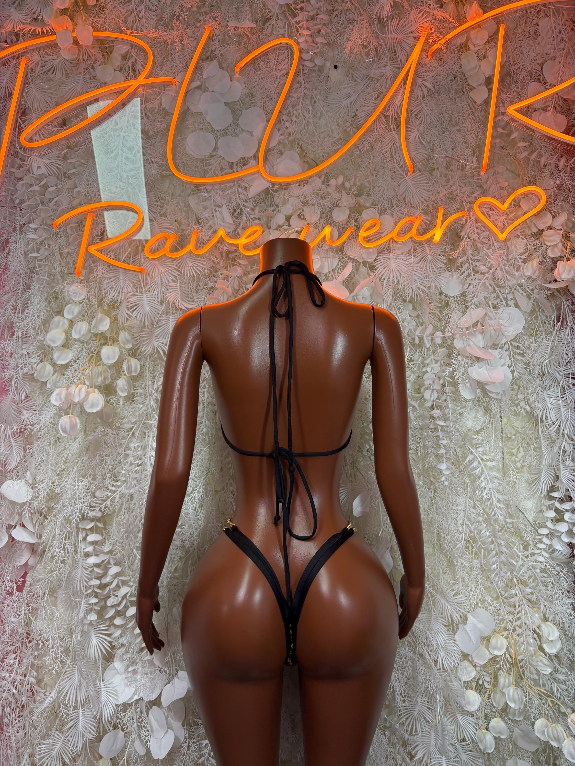 Leopard print two-piece bodysuit, strappy back and lace-up tie details, thong bottom