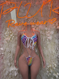 One-piece bodysuit with heart-print cups and rainbow leopard pattern, white tie strings
