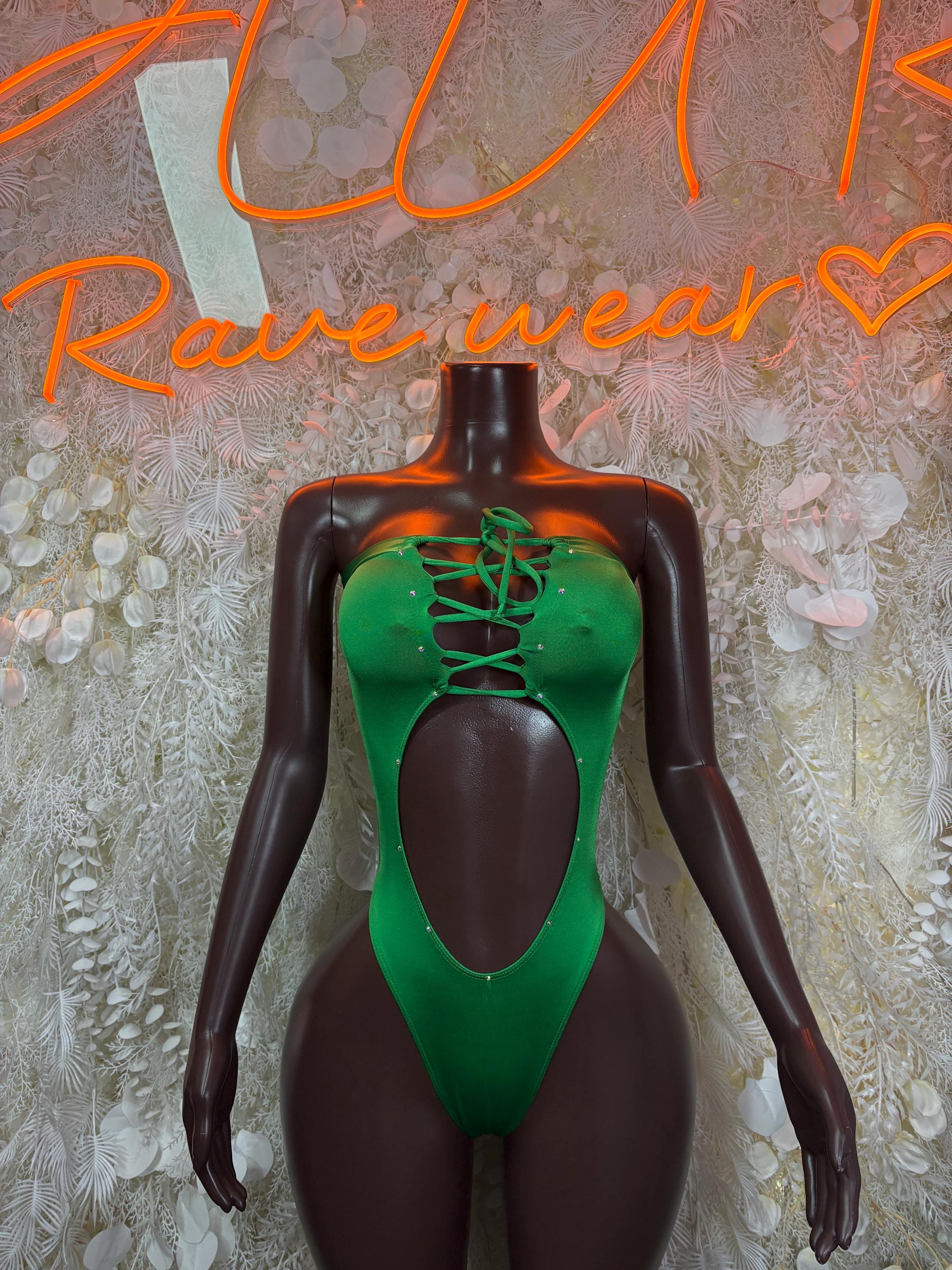 Green lace-up halter bodysuit with deep cutout bust and thong style back