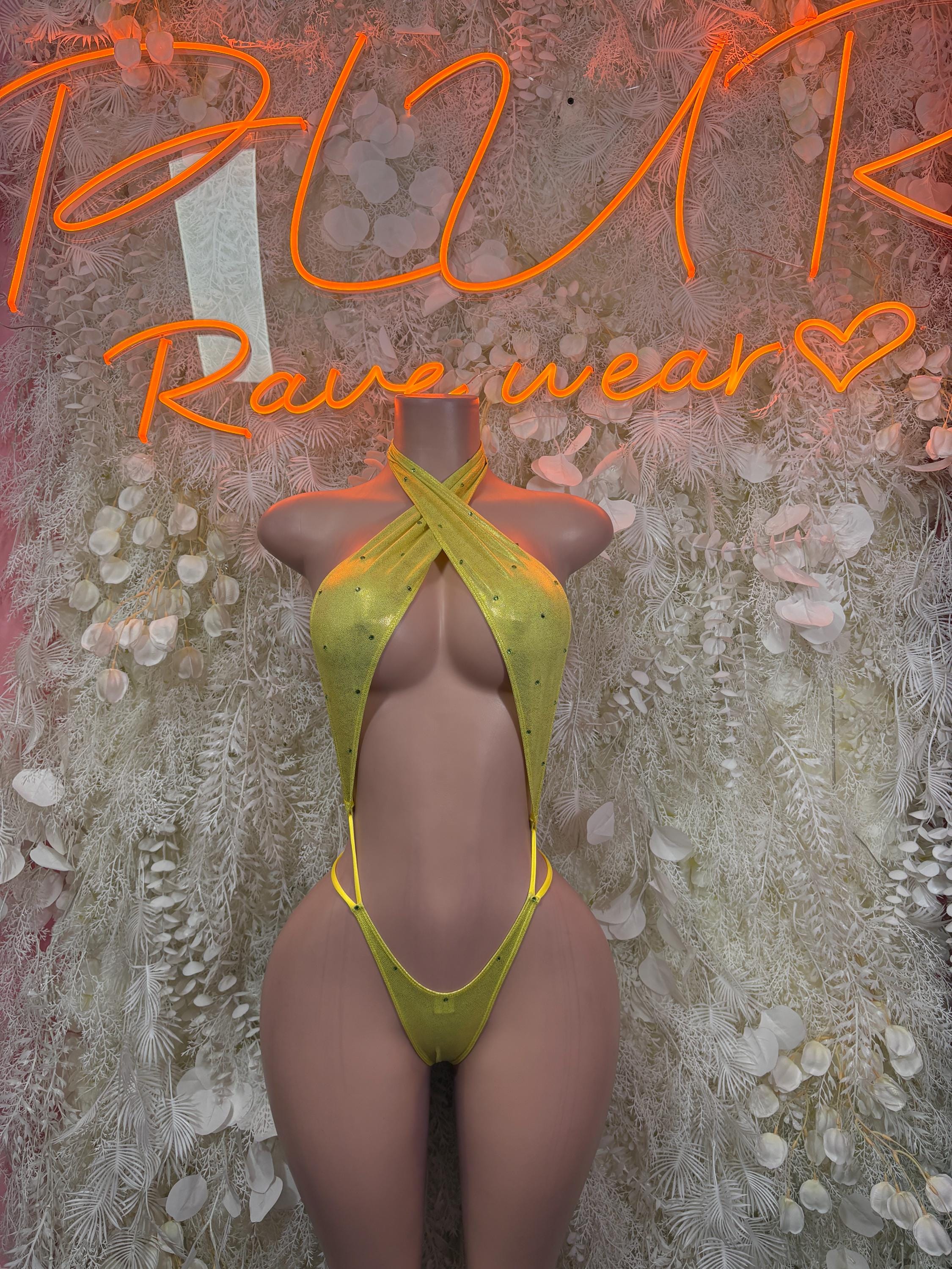 Yellow metallic bodysuit with halter neckline, high-cut front, and thong back