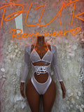 White fishnet bodysuit with long sleeves and lace-up cutout front