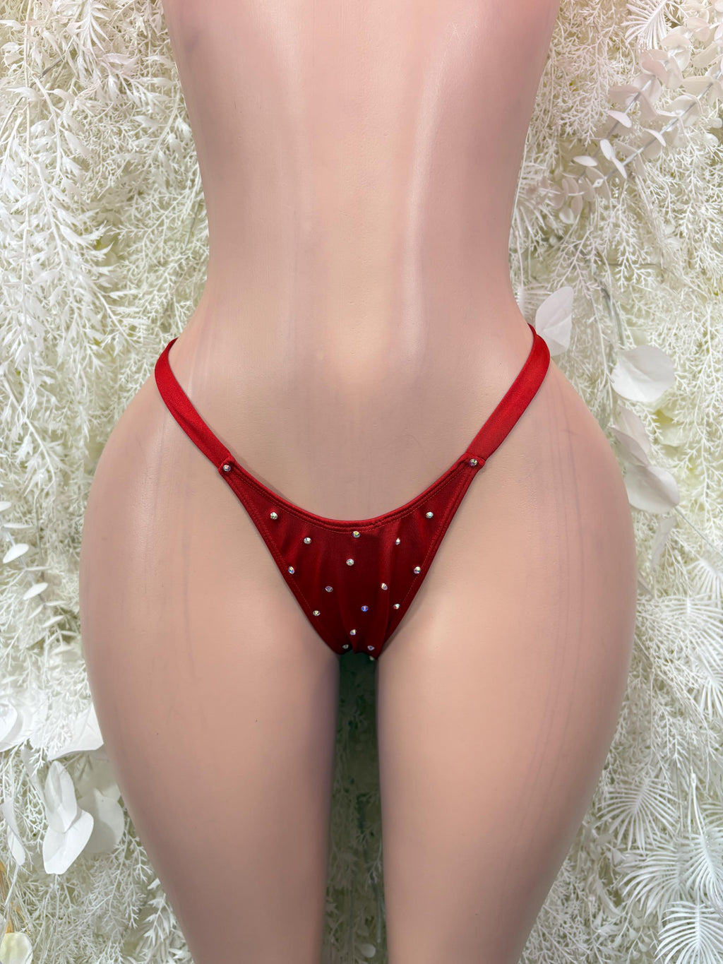 Red thong underwear with small V front and stud accents