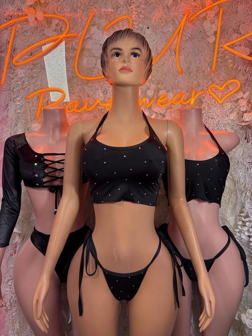 Black two-piece dancewear set: strappy lace-up crop top with long sleeves and matching bottoms