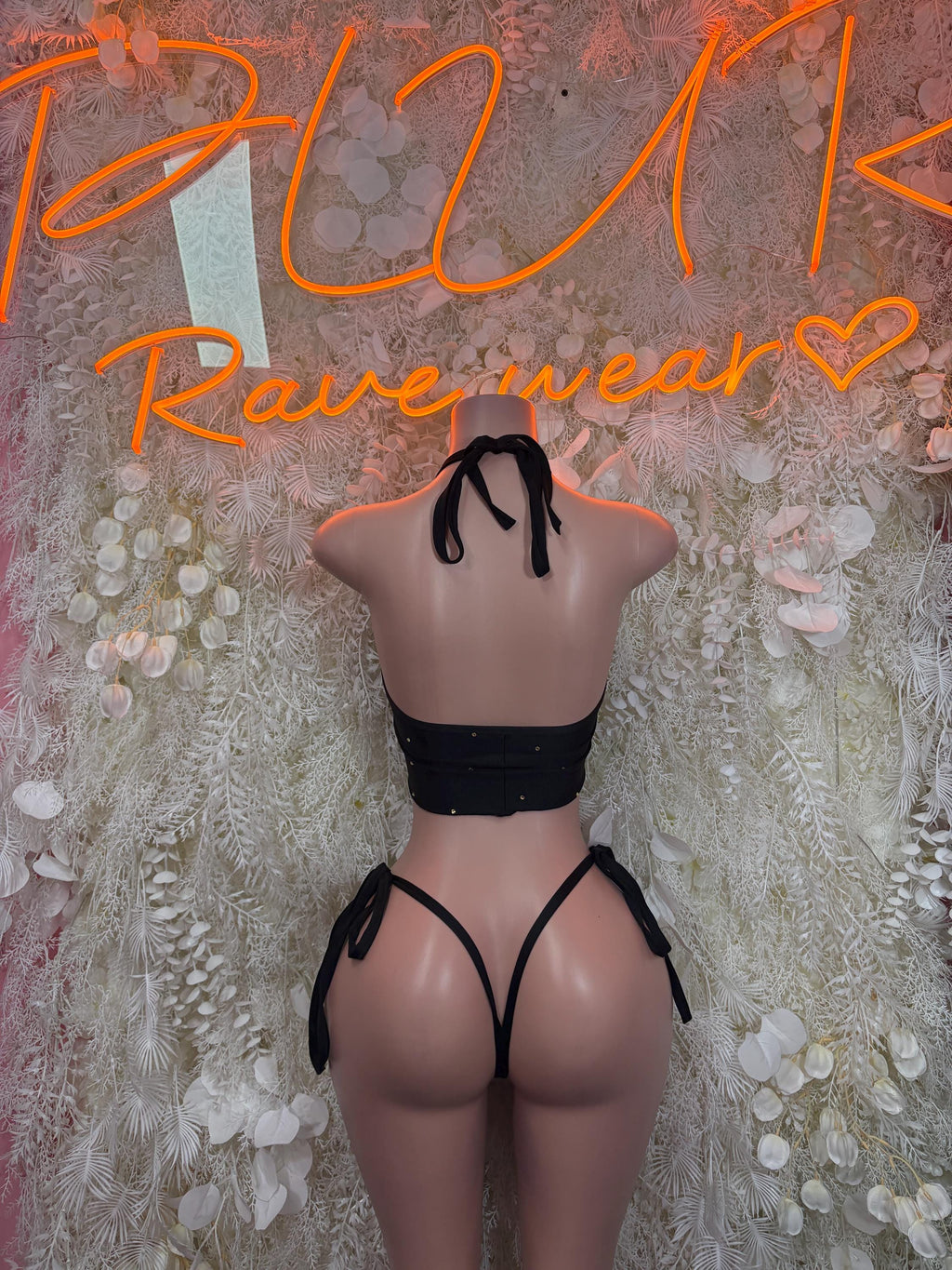 Black two-piece set with lace-up back crop top and tie-side thong bottoms