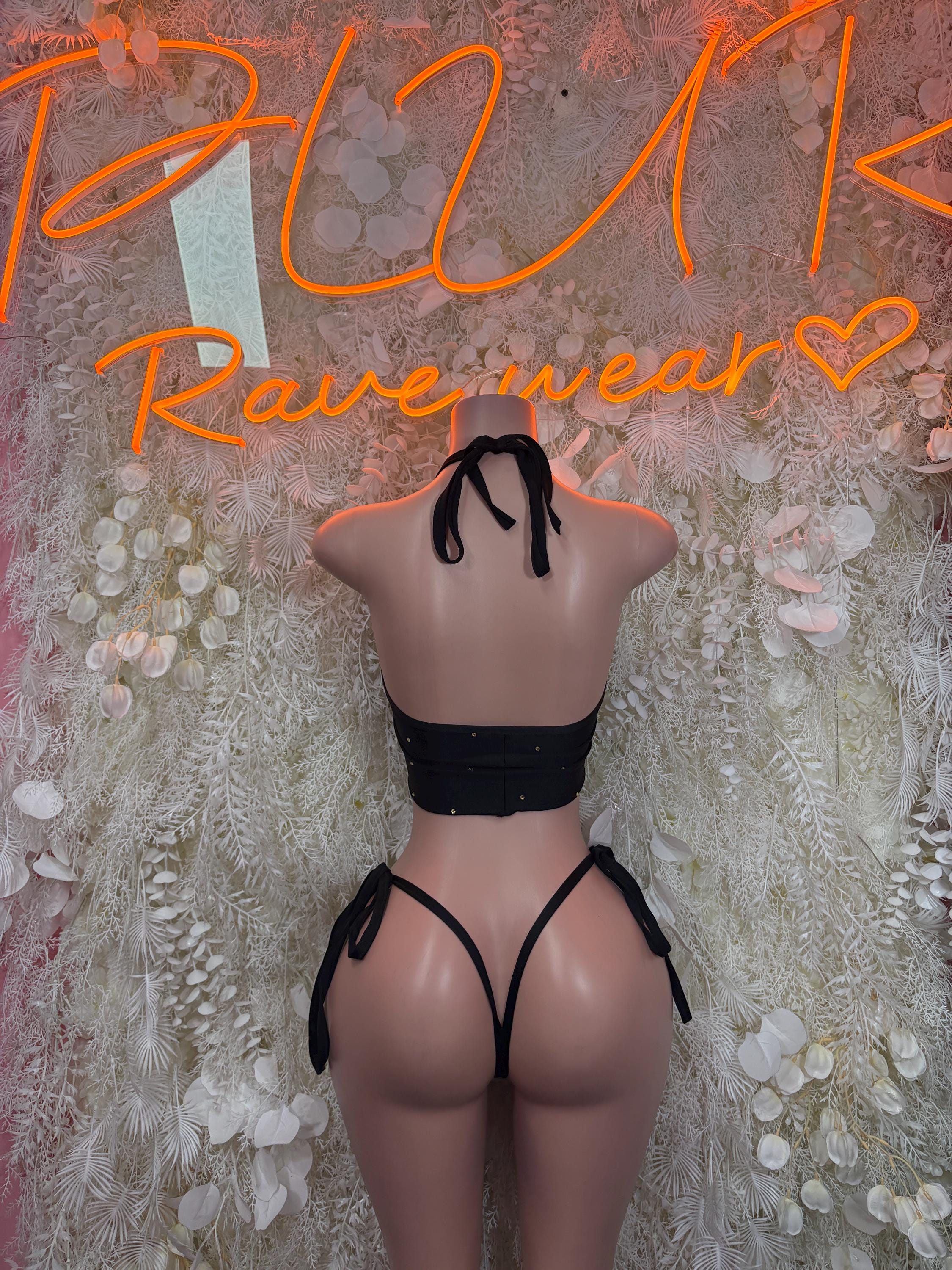Black two-piece set with lace-up back crop top and tie-side thong bottoms