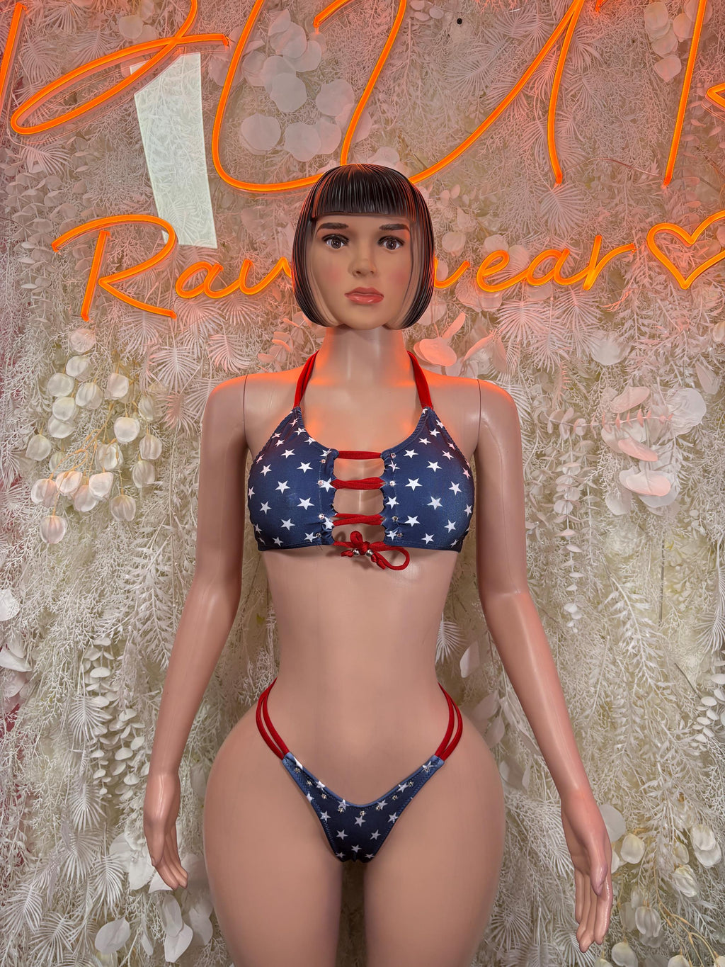 Patriotic stars and stripes two-piece bikini with red ties on navy blue top and bottoms