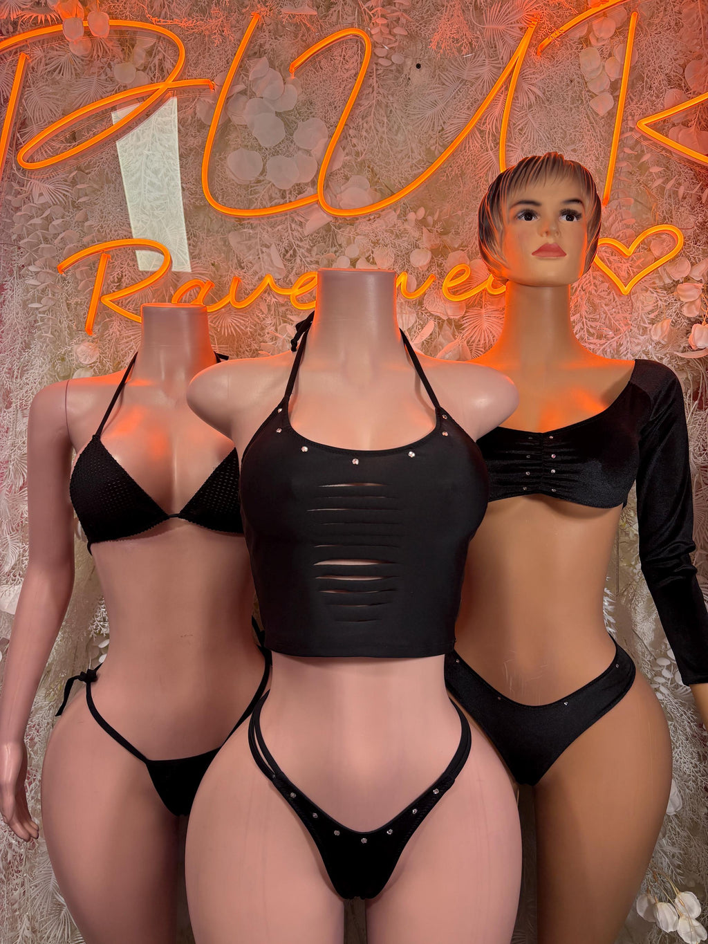 Black two-piece set: long-sleeve crop top and matching high-cut bottoms