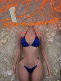 Royal blue rhinestone-speckled bikini set with tie halter top and string bottoms