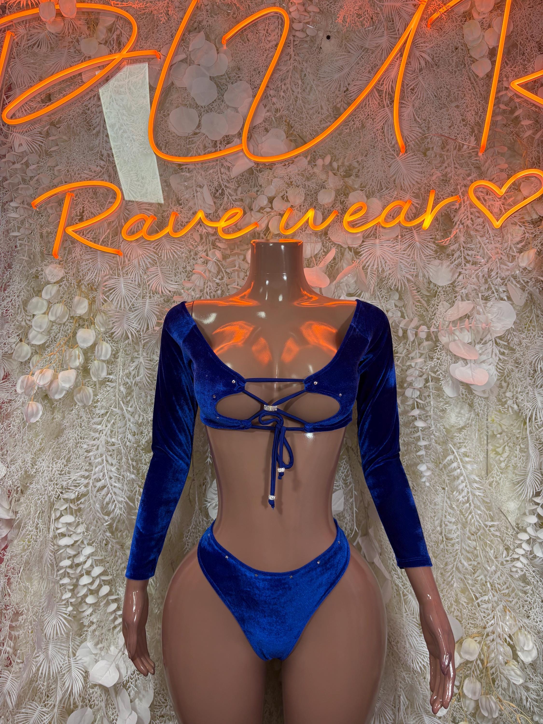 Royal blue velvet long-sleeve crop top with lace-up back and matching high-cut bottoms