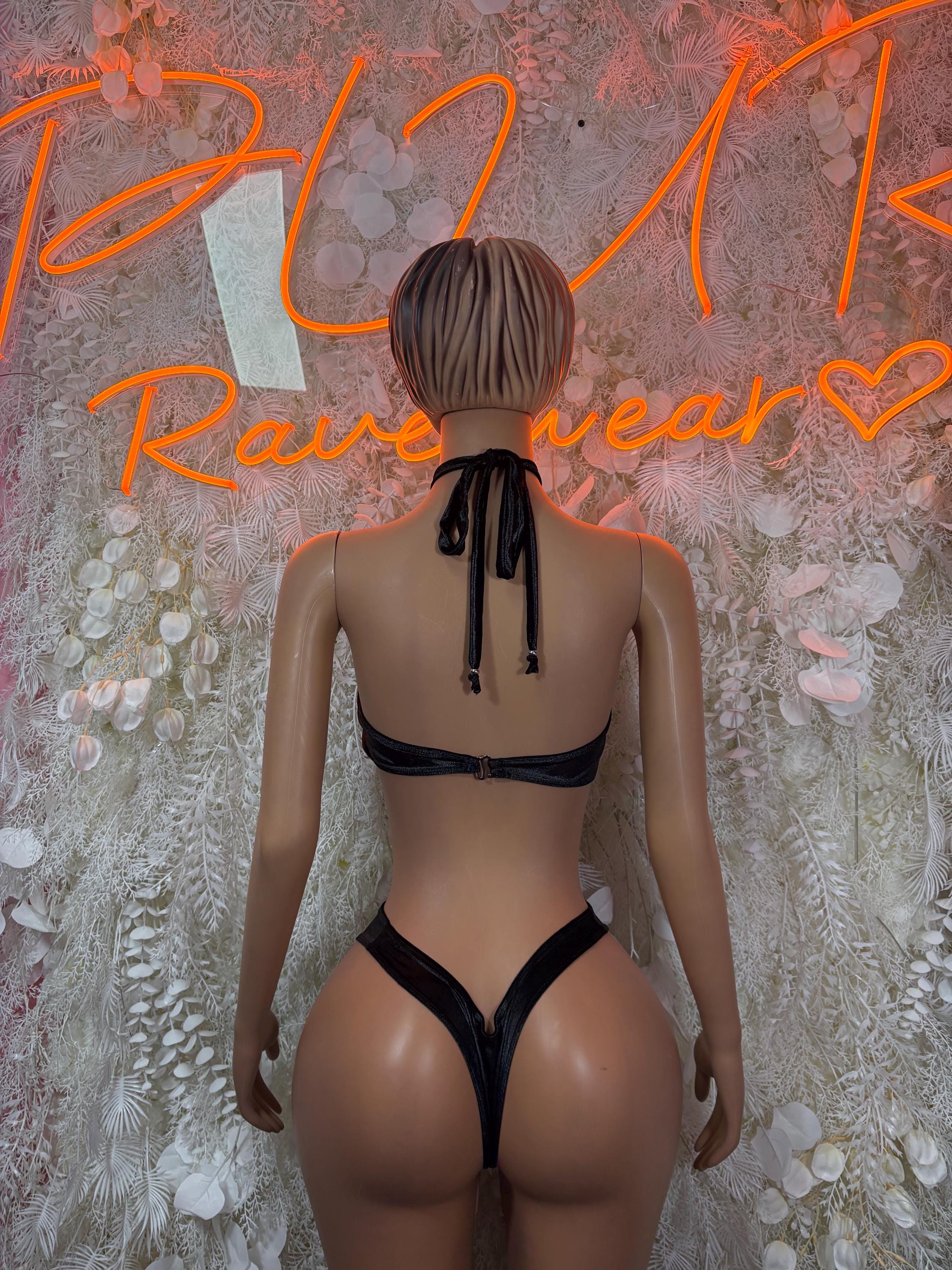 Black two-piece bikini set, back view with crisscross strap tie and thong bottoms