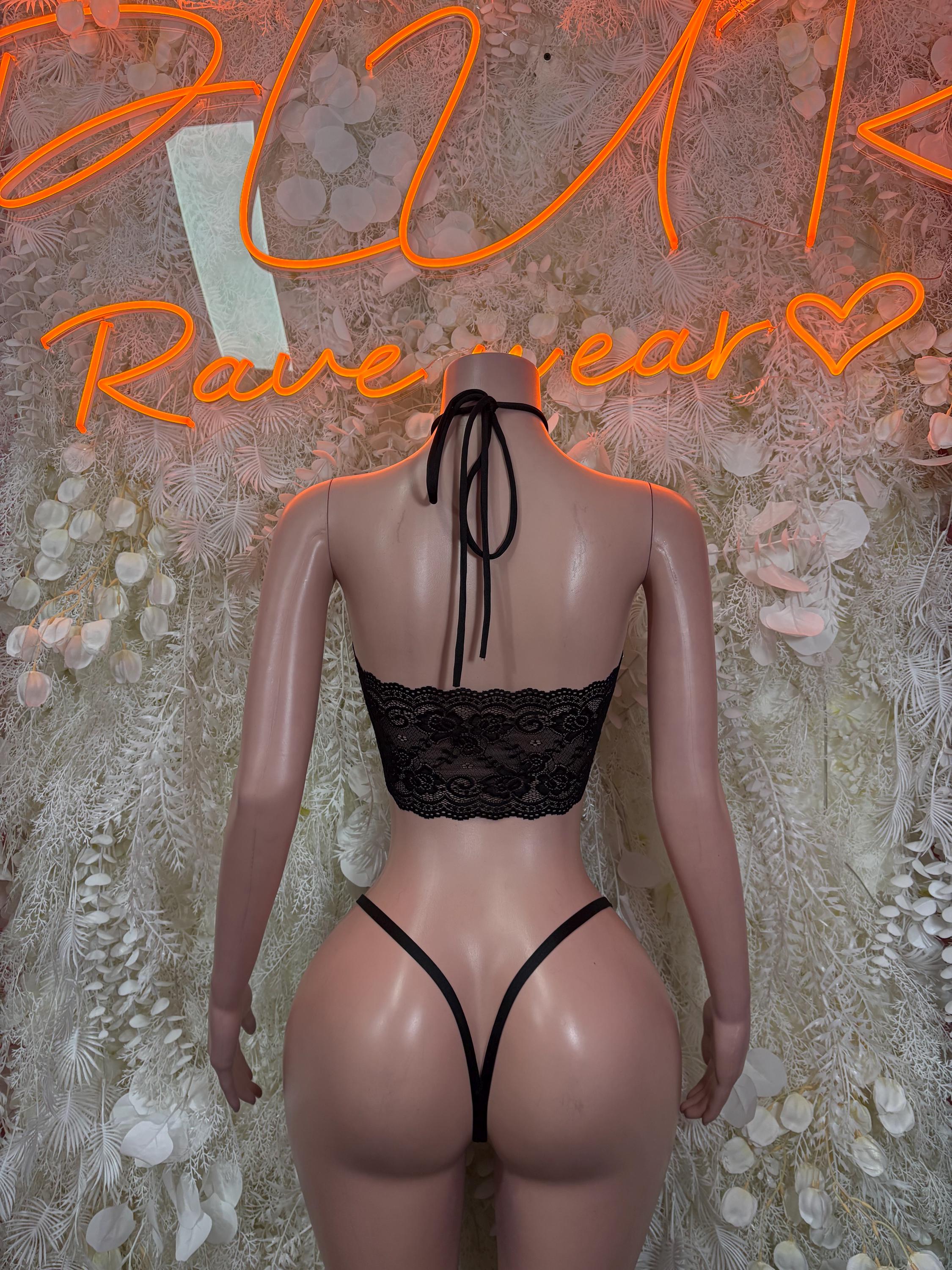 Black lace bikini set with halter bralette and thong bottoms, back tie bow