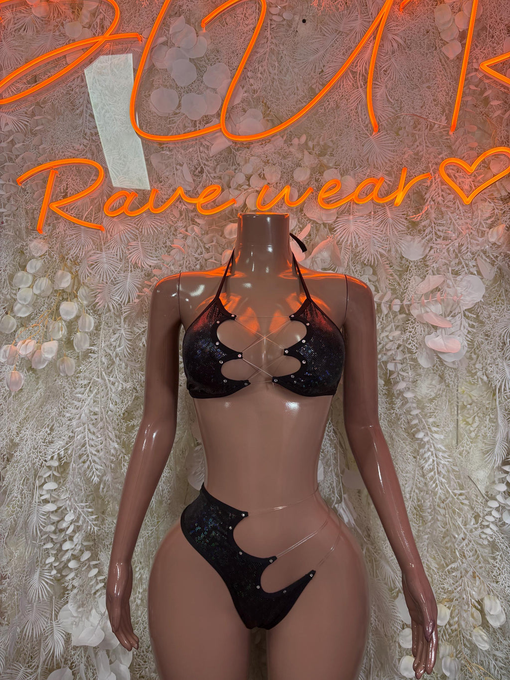Black halter bikini set with lace bra and matching high-cut bottoms