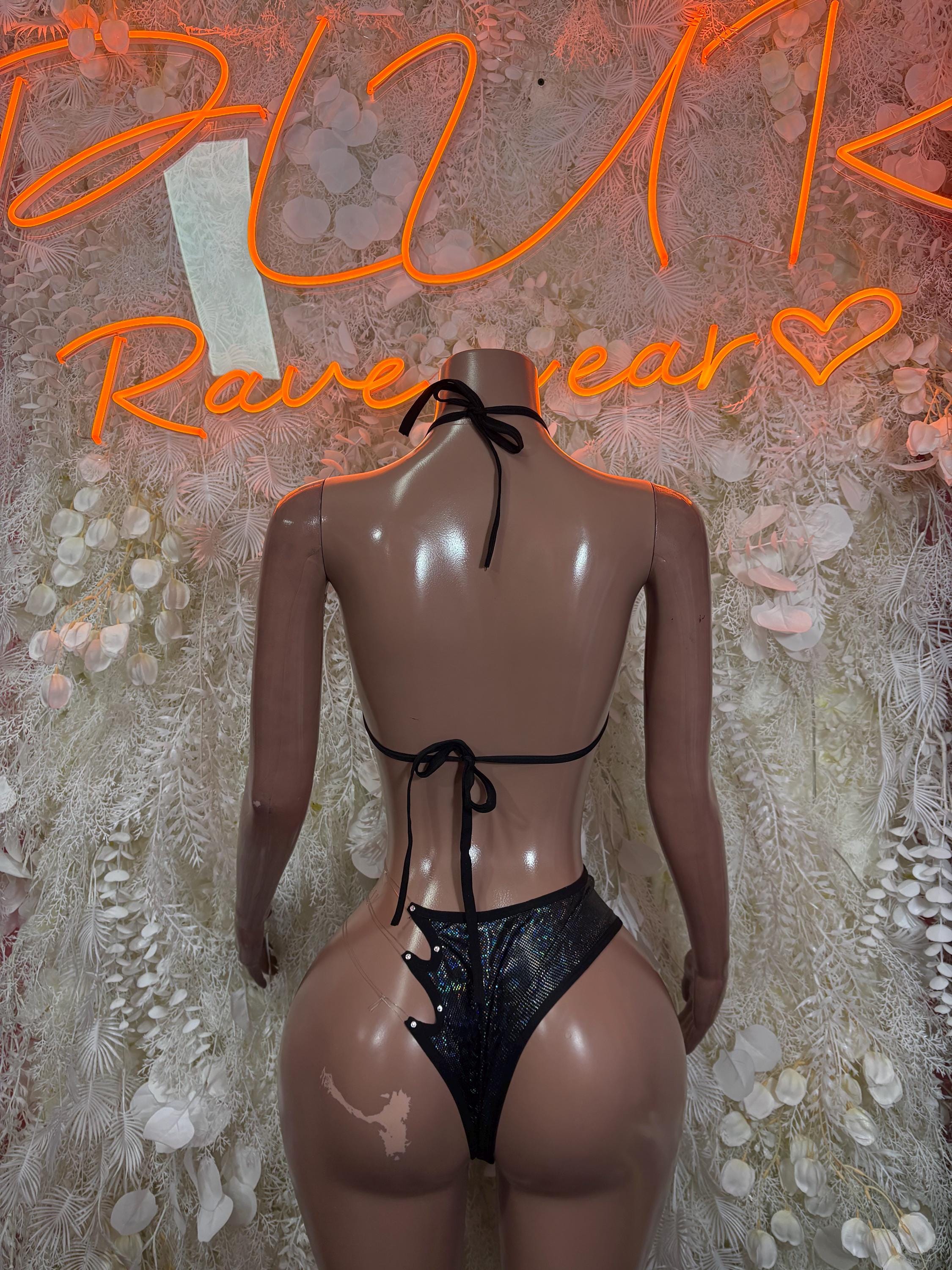 Black bikini lingerie set back view with crisscross straps and lace thong bottoms