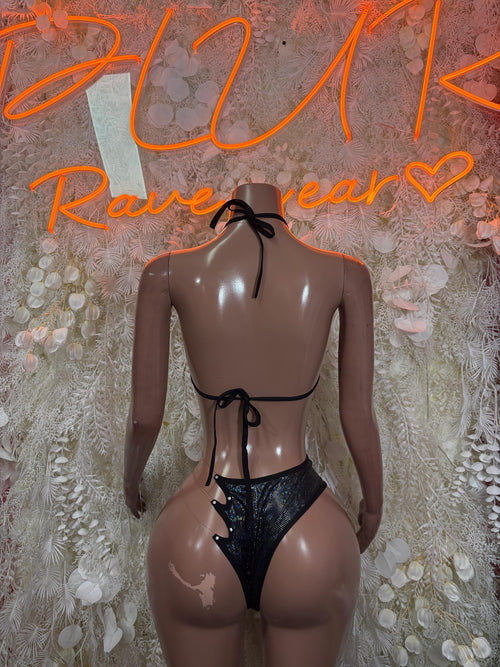 Black bikini lingerie set back view with crisscross straps and lace thong bottoms