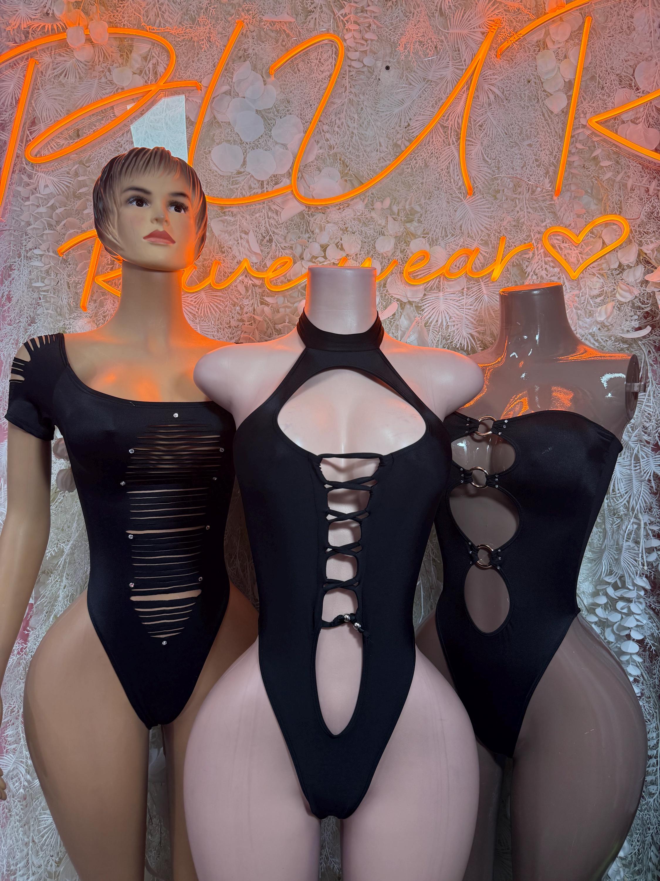 Black cutout bodysuit with halter neckline and lace-up central chest cutout