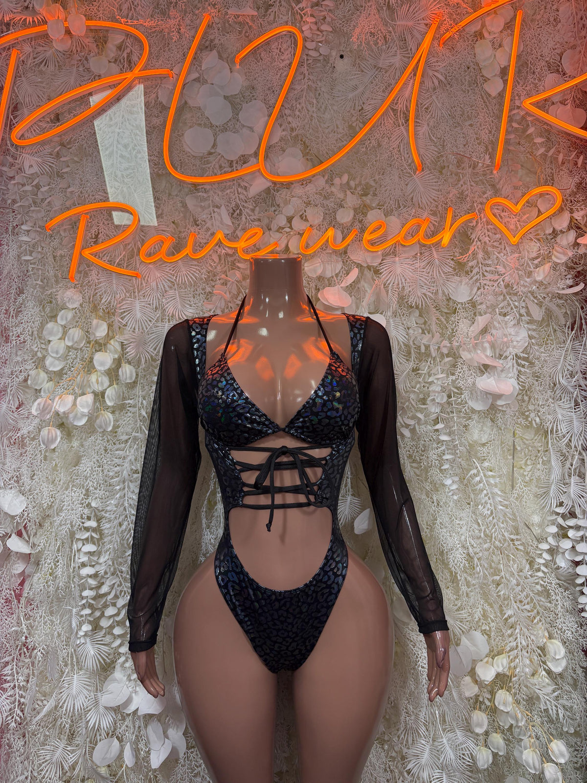 Black metallic cheetah one-piece bodysuit with sheer long sleeves and lace-up front