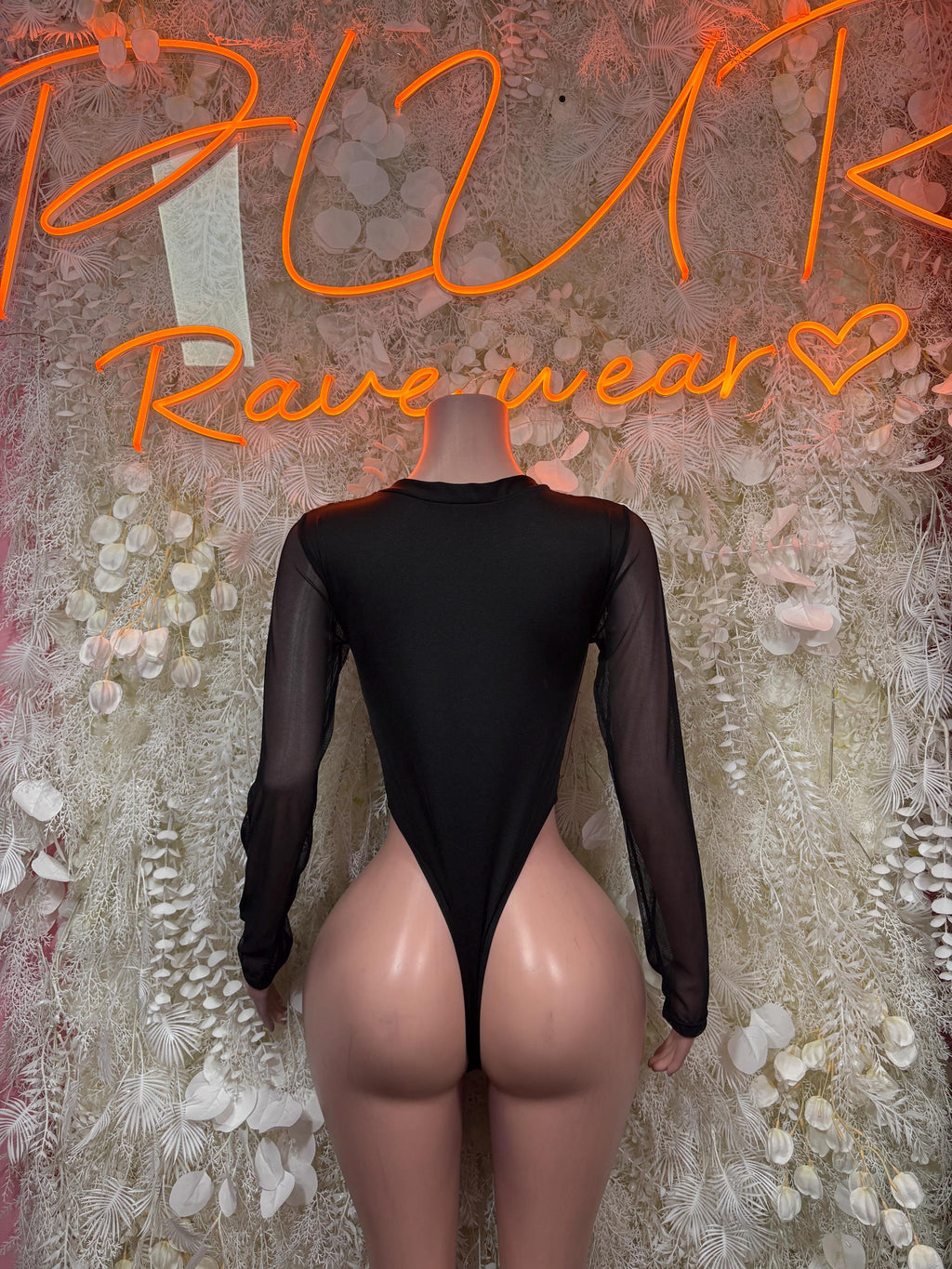 Black sheer sleeve one-piece bodysuit with high back and cheeky leg cut