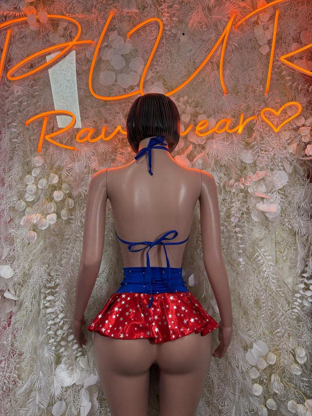 Patriotic two-piece skirt set, open-back blue bikini top and red star ruffled skirt