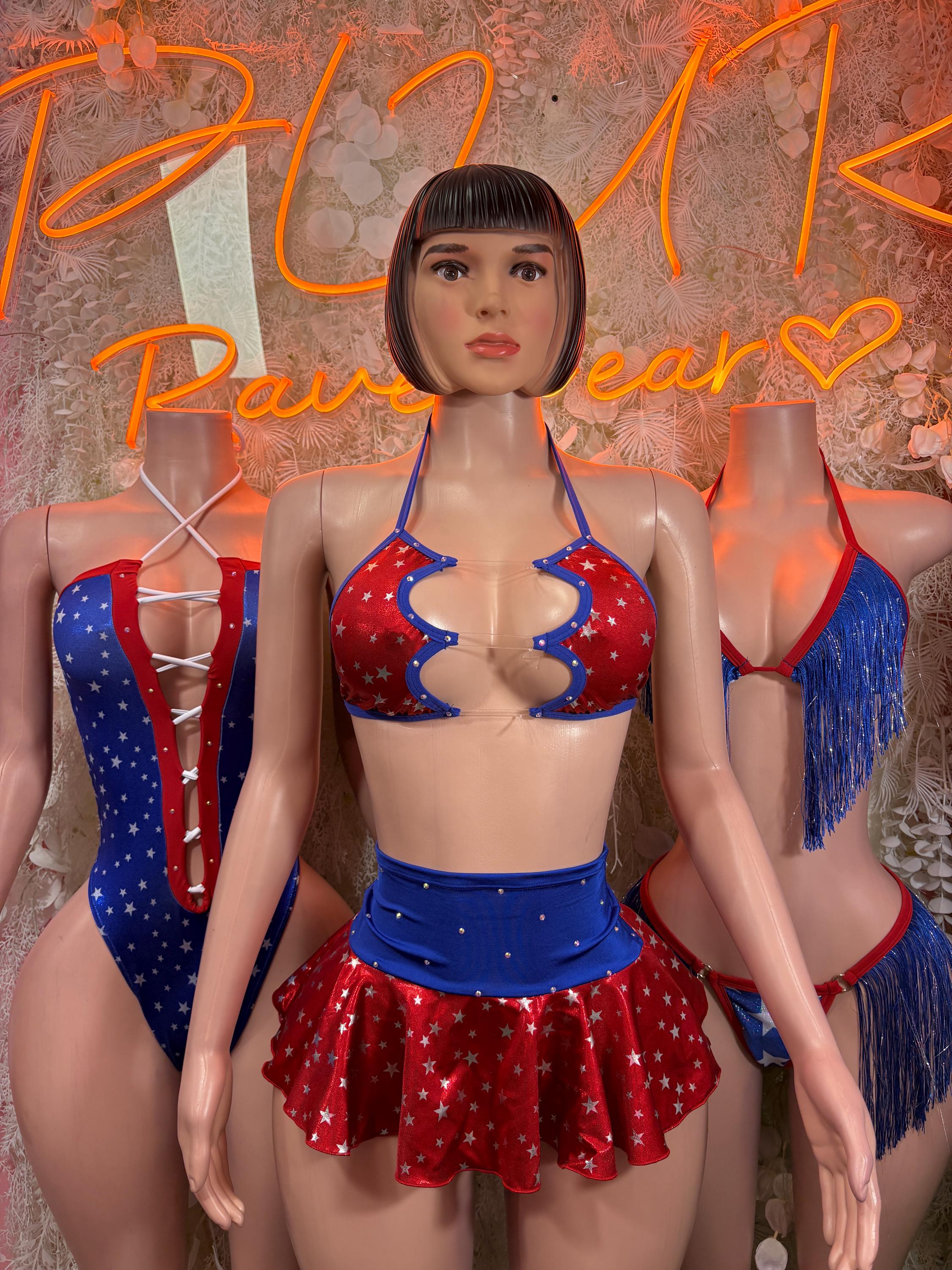 Patriotic two-piece fringe outfit with star bra, blue fringed bottoms, and red skirt