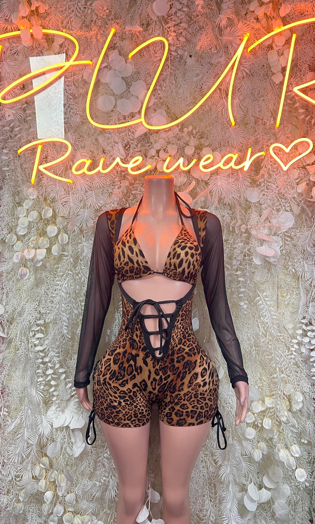 Leopard print bodysuit romper with lace-up back and sheer black sleeves