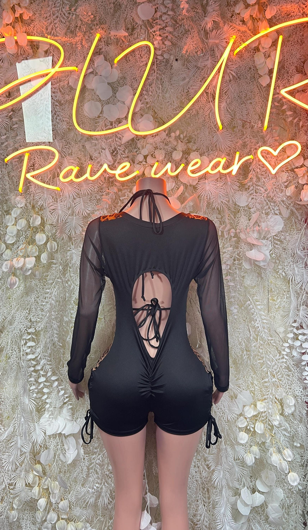 Leopard print bodysuit romper with lace-up back cutout and sheer sleeves